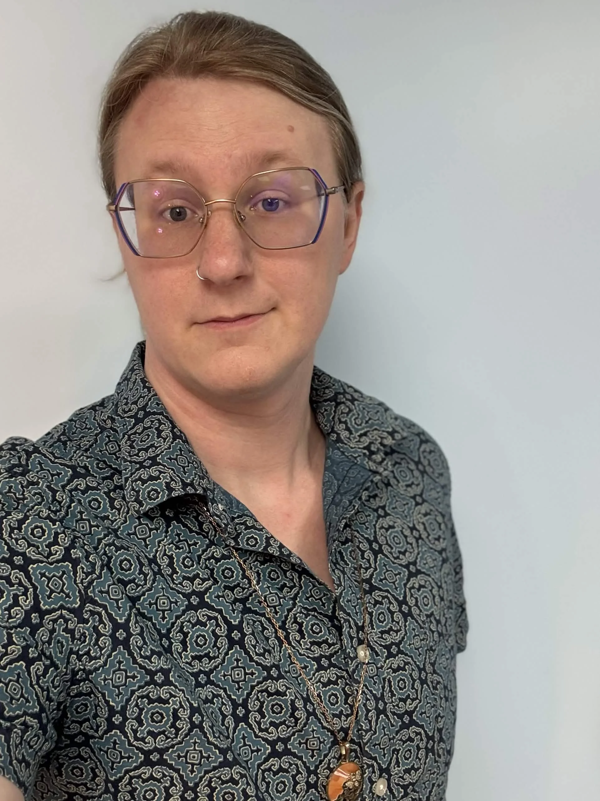 Nigel Turk, a genderfluid mental health therapist, presenting as masculine