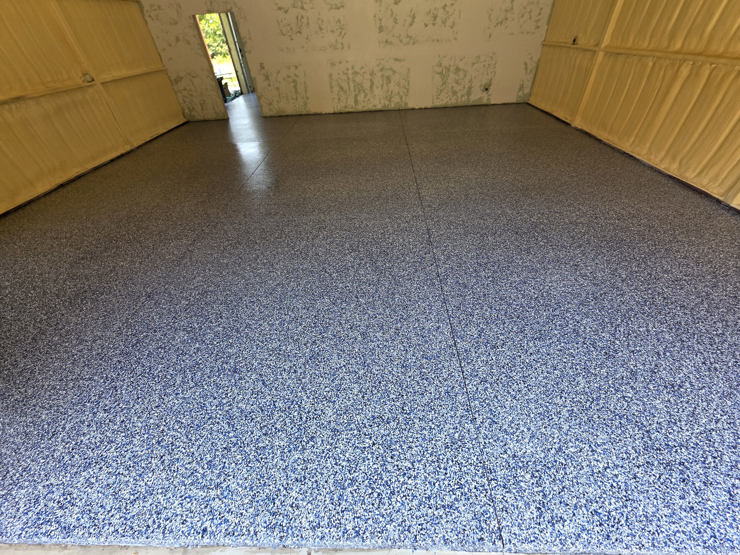 3 - Tinted body coat, Flake, and Clear Polyaspartic topcoat has been applied