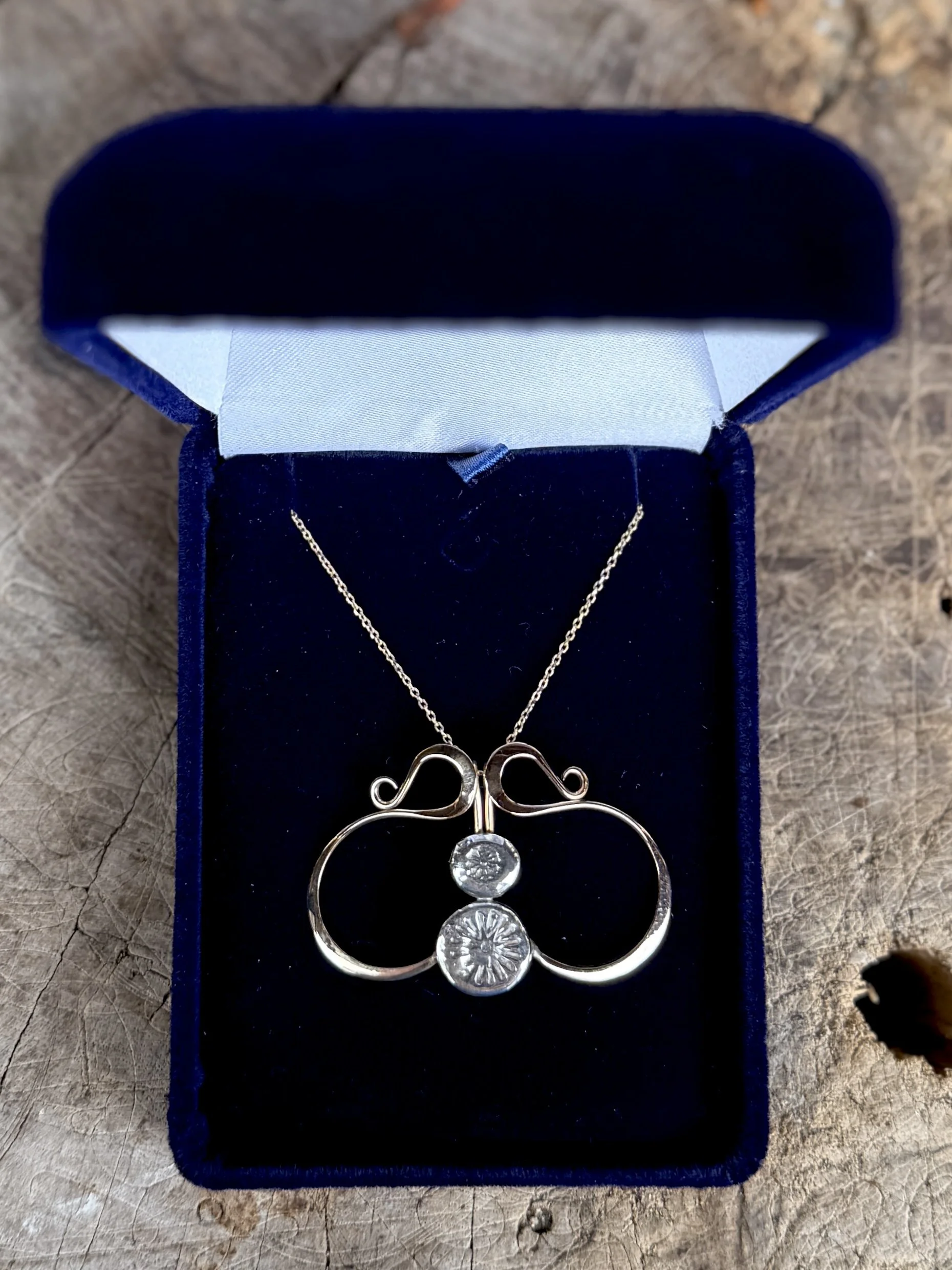 two-toned asymmetrical hand made pendant 