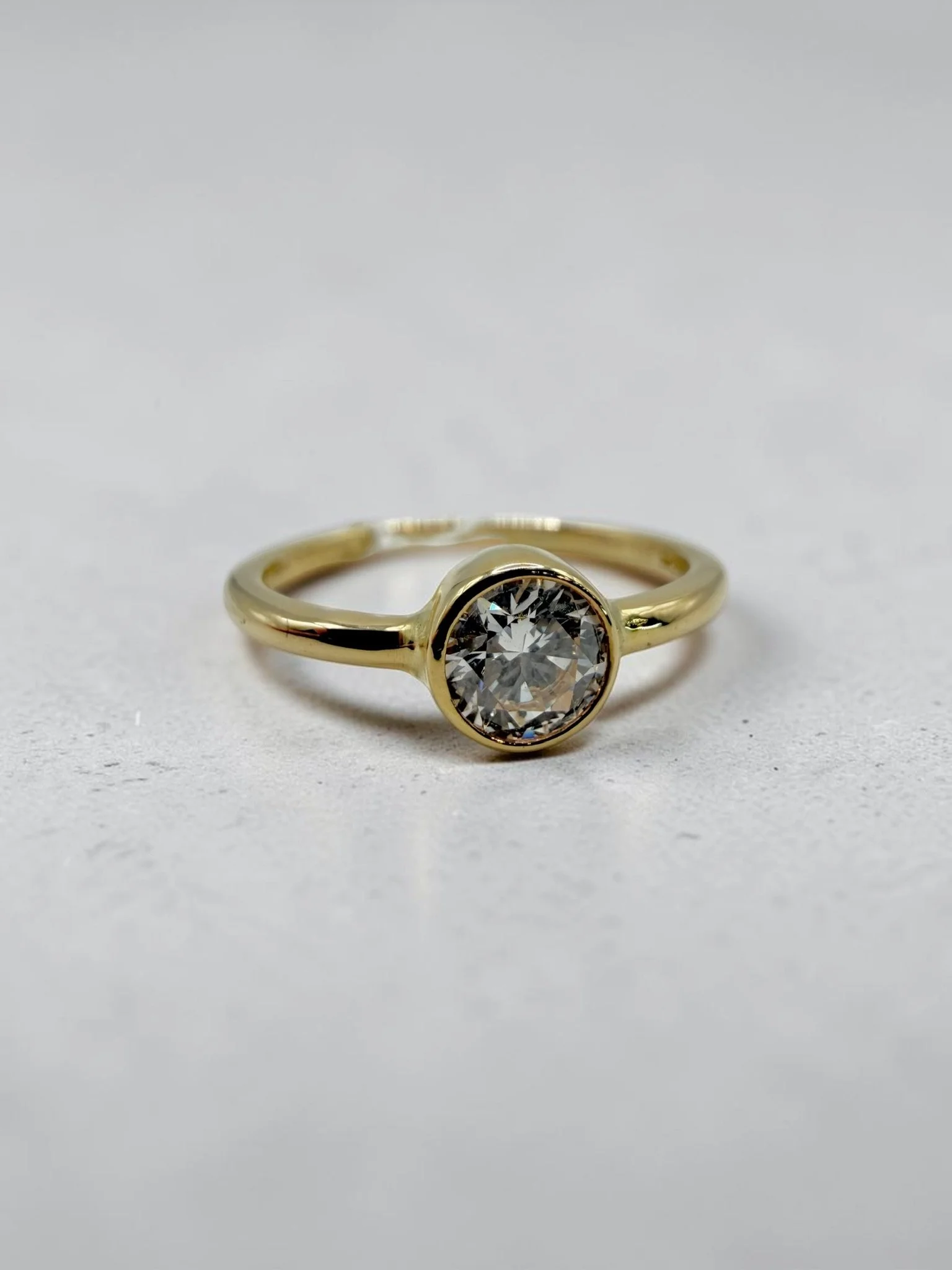 Handcrafted Bezel Set Diamond Ring in 14K Yellow Gold