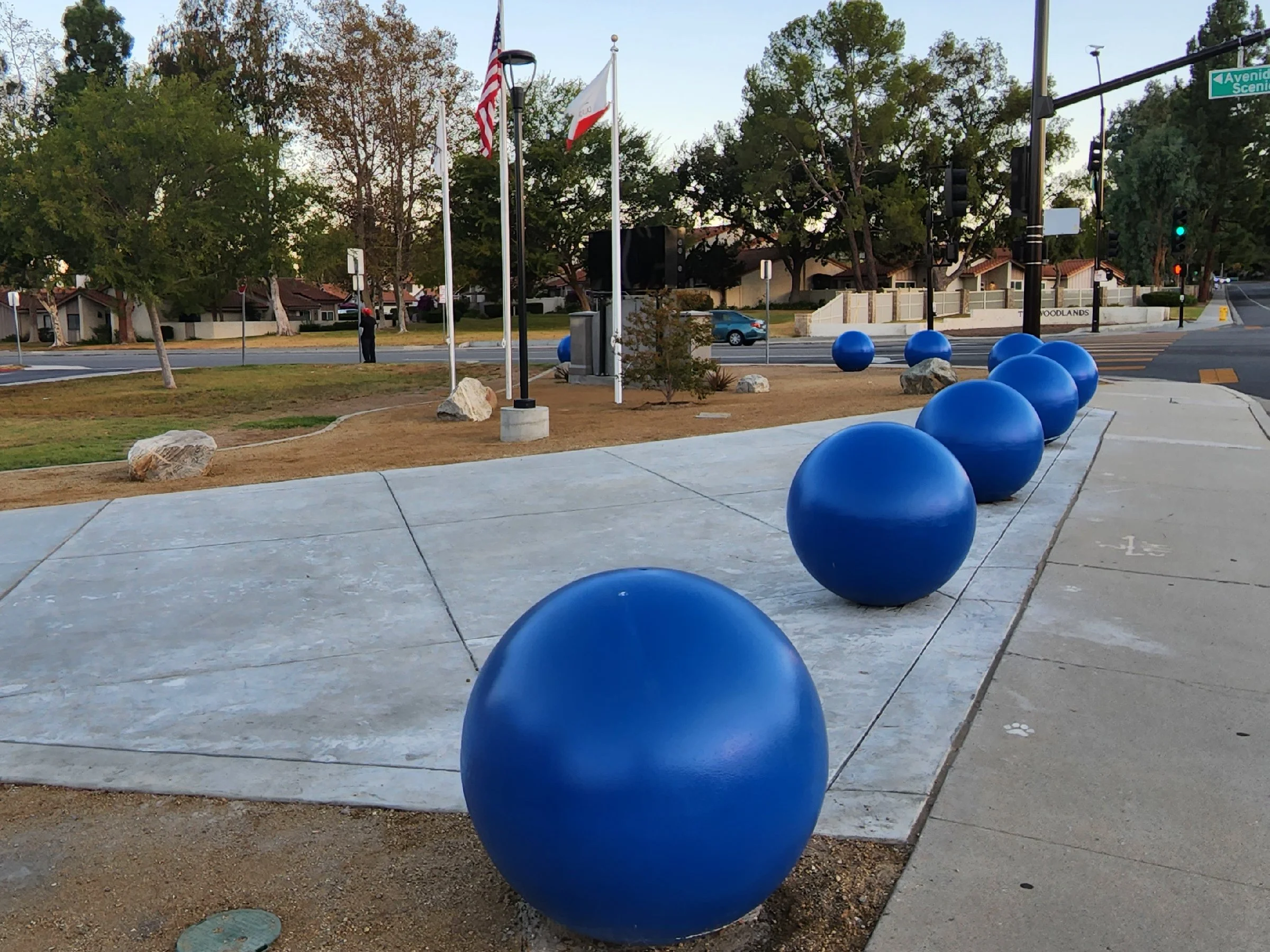 Blue painted sphere bollards.jpg