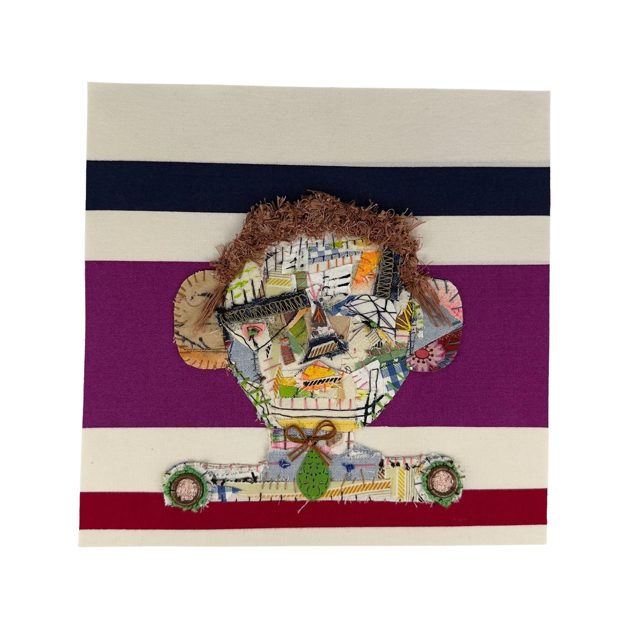 Mixed-media textile portrait titled Boy Who Knows Everything by Evangelina Roa, composed of fabric scraps, thread scraps, found elements, and layered stitching.