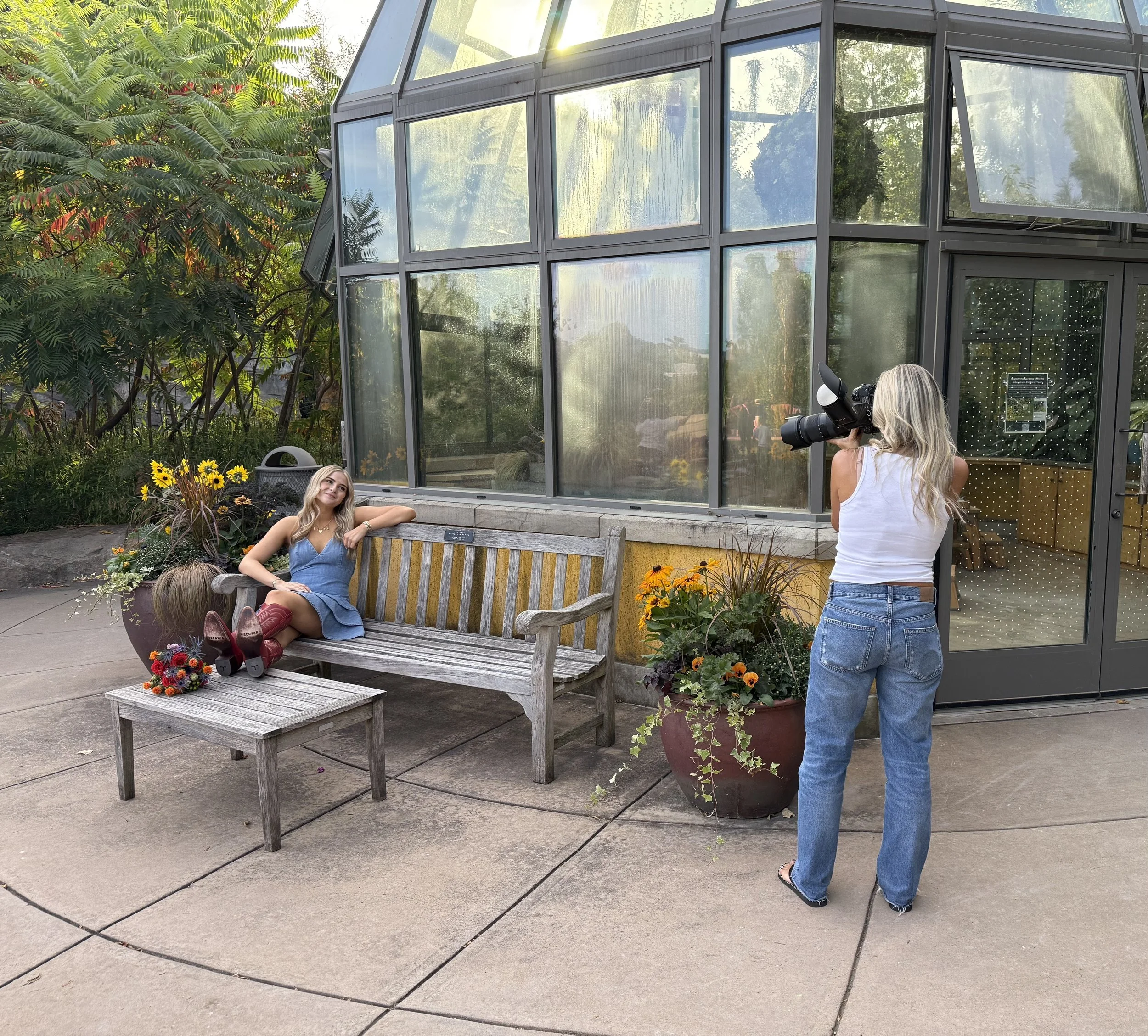 Behind the scenes photo of Tish OConnor taking pics of high school senior at the penn State arboretum