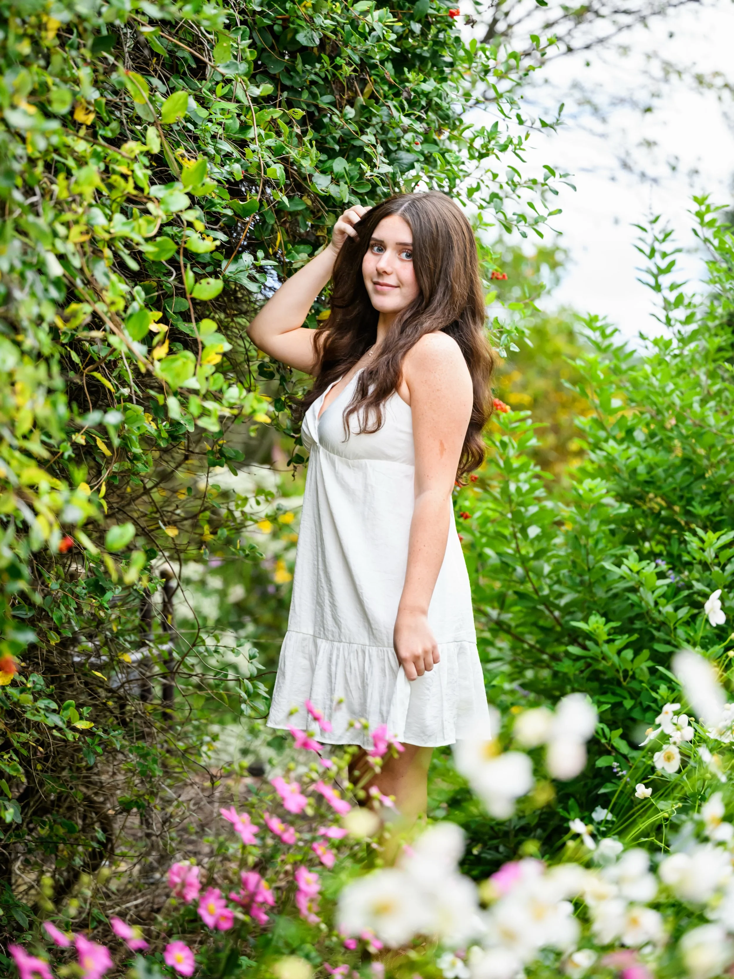 Audrina, you were absolutely stunning, and these flowers were the perfect way to kick off your senior session. Fall may be here, but the blooms are still hanging on, and they complemented you beautifully. Every look you brought was so perfectly you, 