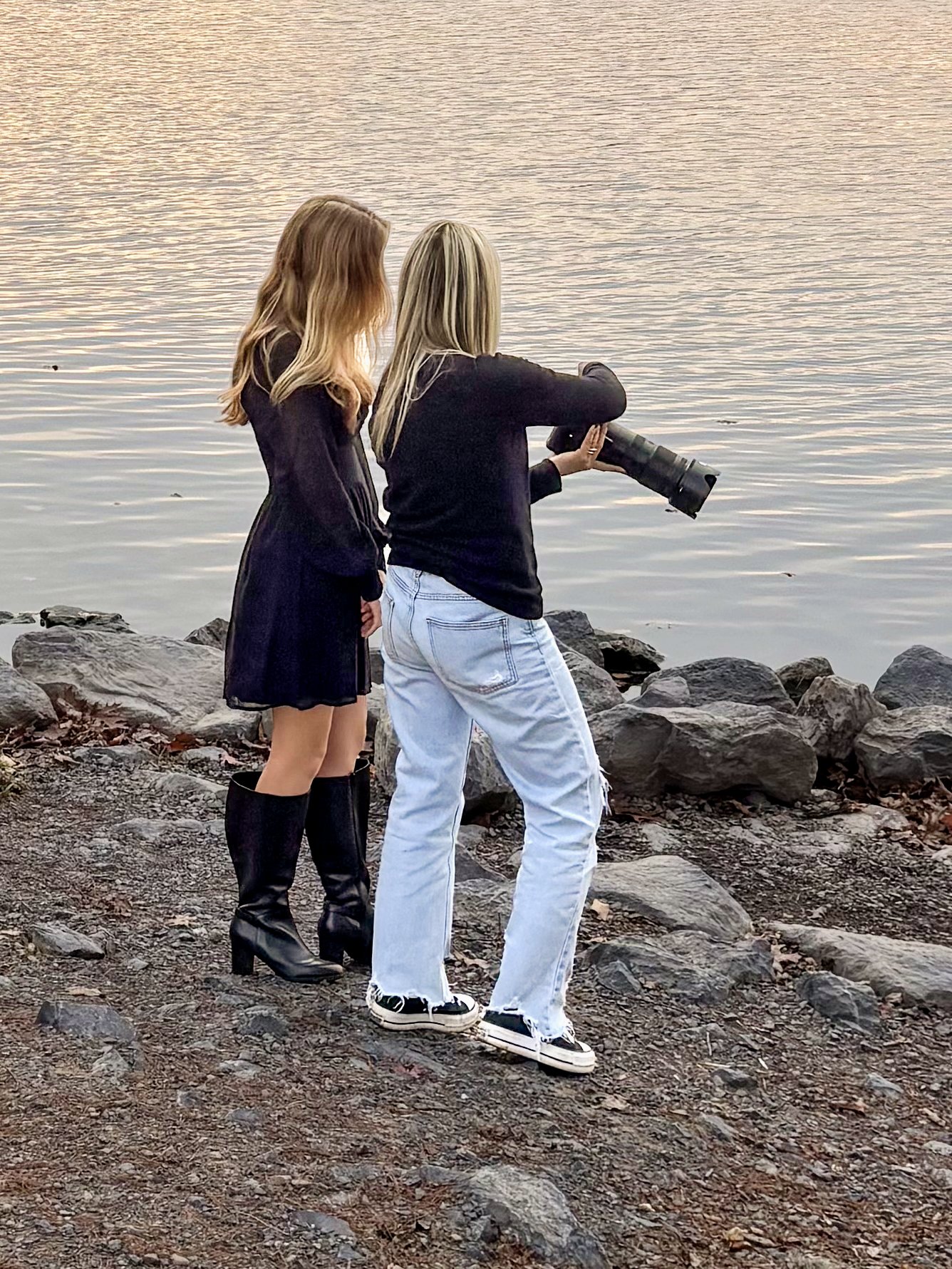 behind the scenes photo of senior portrait session with Tish OConnor showing senior girl in black dress back of camera 