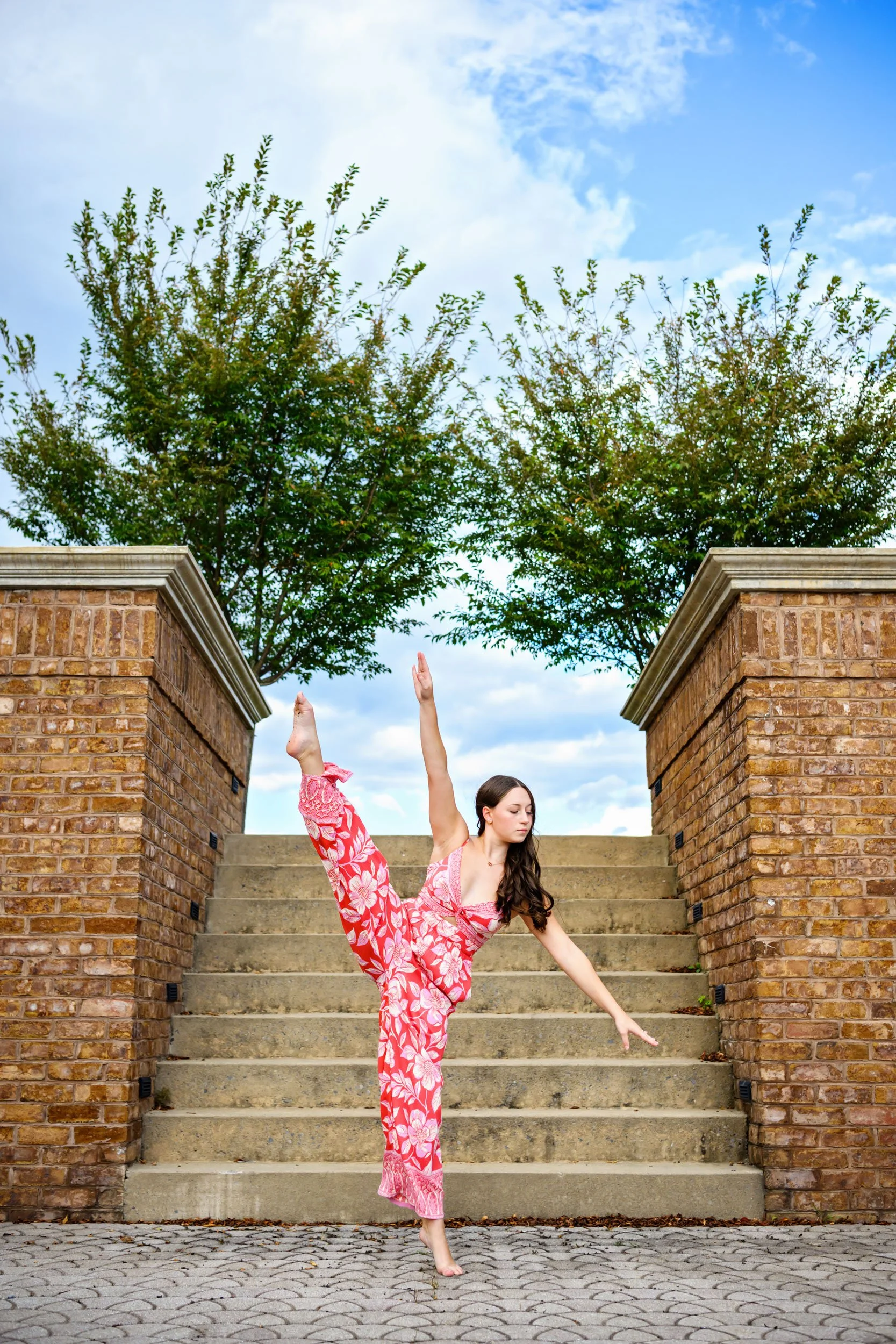 Senior photos of dancer at LKW Dance Center in Montoursville, PA doing a high Kick / Kick Extension