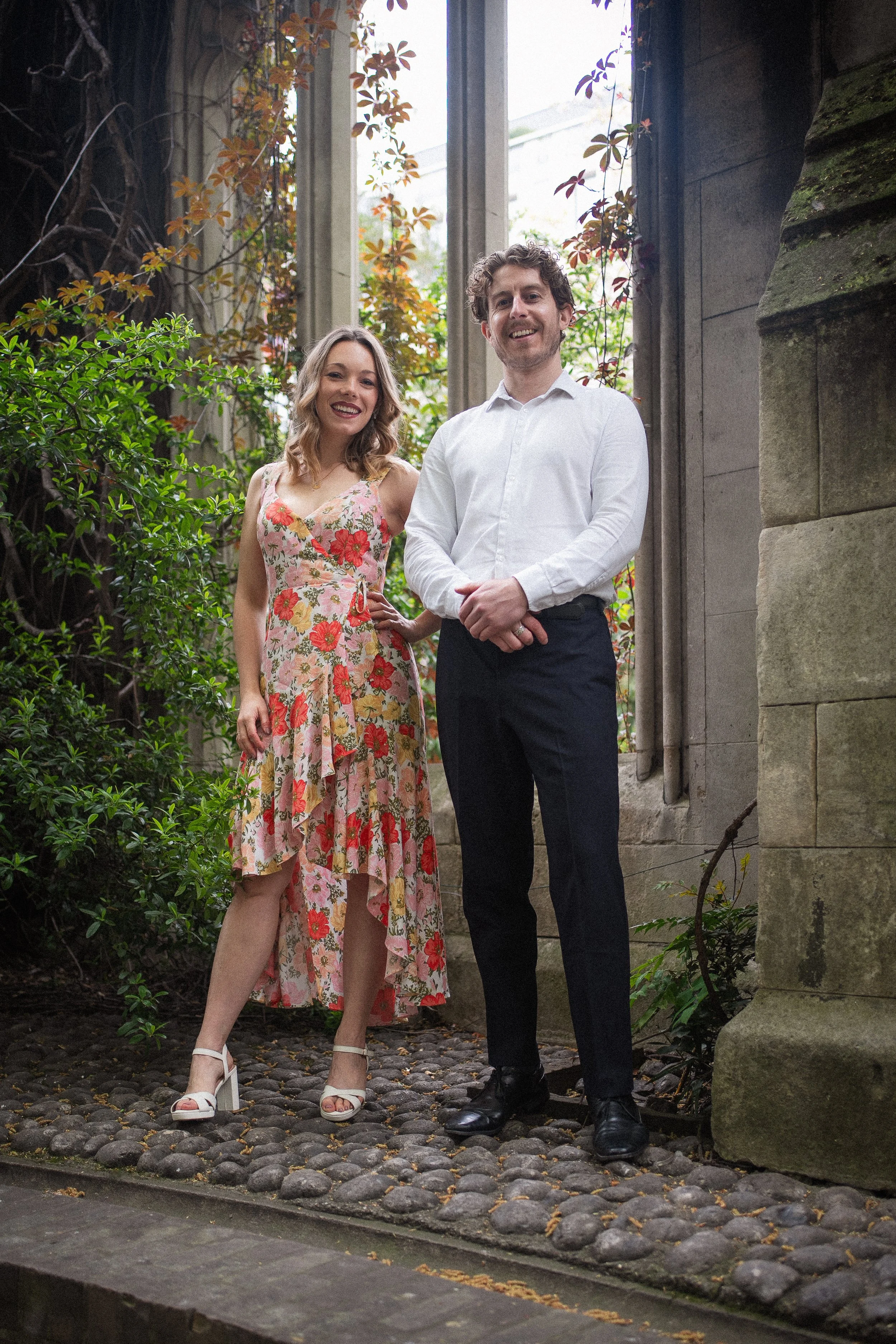 Acoustic duo standing outside church ready to perform some acoustic music