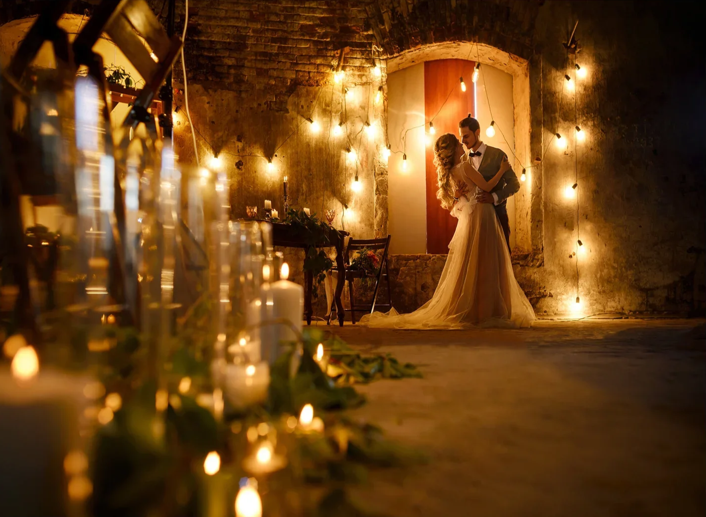 First dance song being played while bride and groom dance together at their wedding venue in Surrey