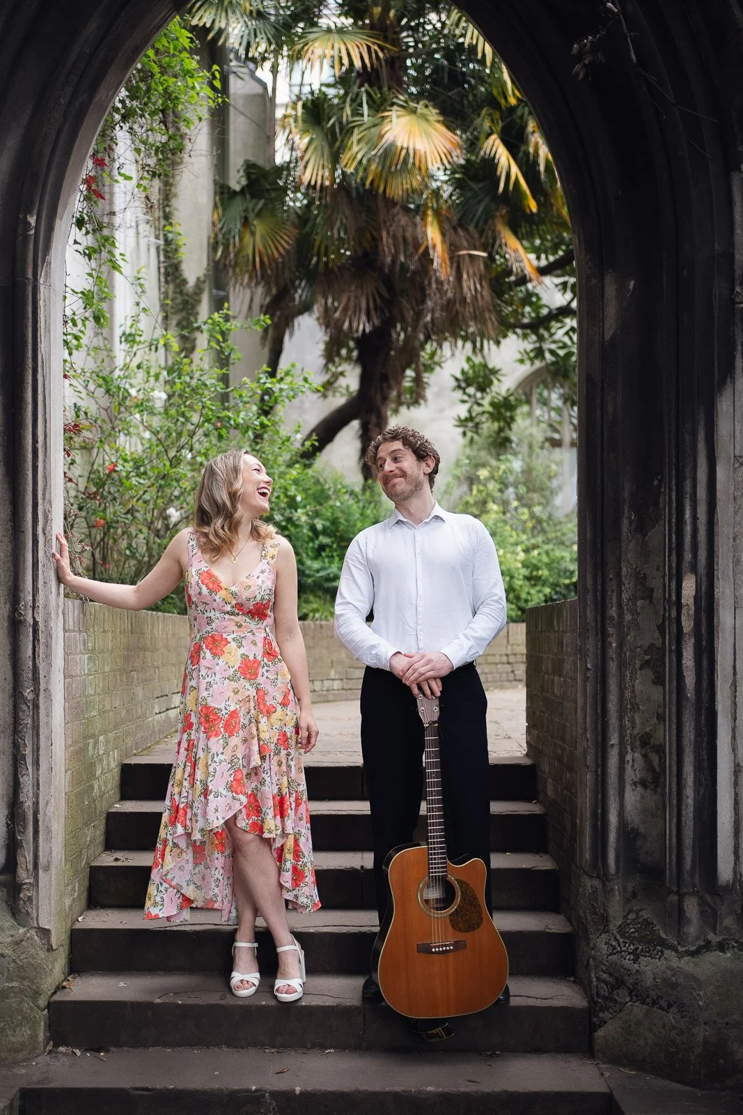 singer and guitarist playing live music