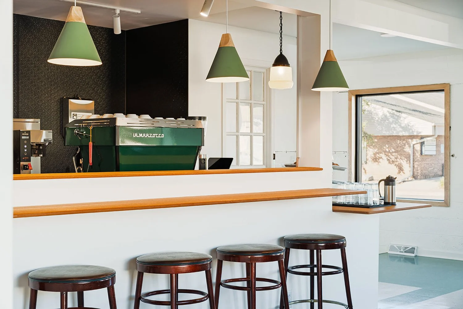 Commercial interior photography for coffee shop in Minnesota showing espresso bar