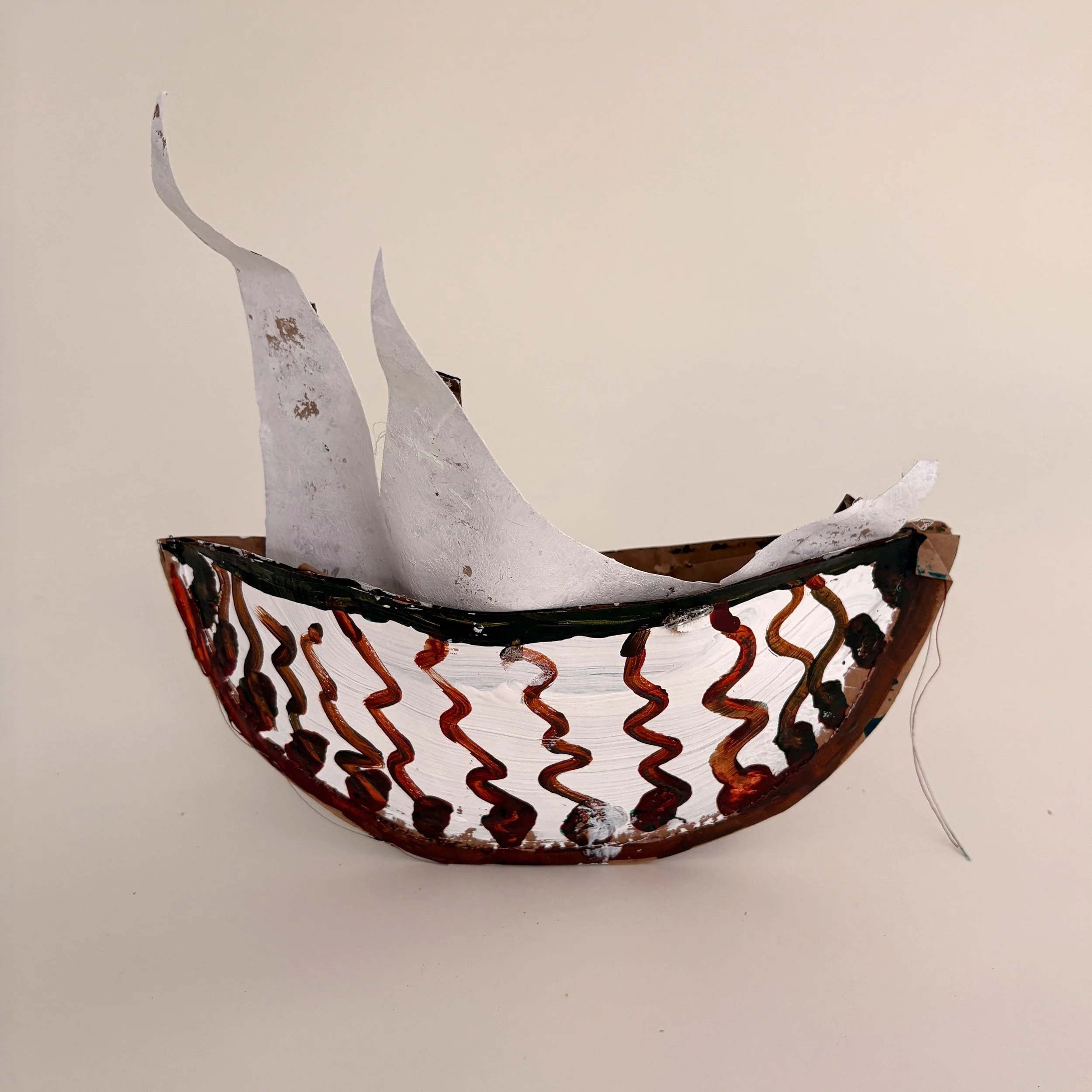FP-RI-103
Carol Grayson, Wakefield, RI  |  One side of this vessel reflects an easy entry into a new land — openness, welcome, and forward movement. The other speaks to the harsher reality many face: the difficulty of immigration, the strain of uncer