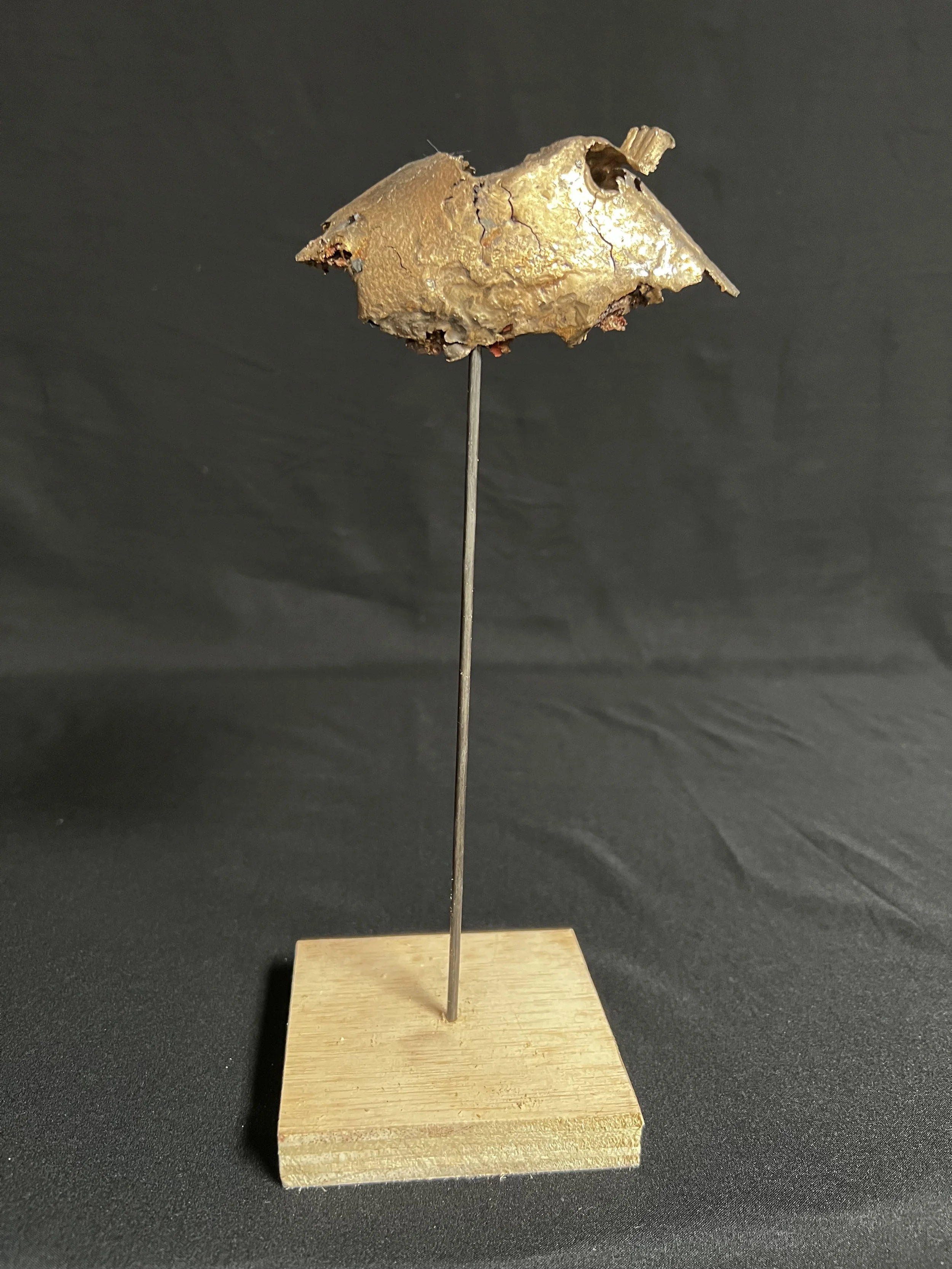 Armor III     11"x4"x4"     Bronze, Epoxy Putty, Paint, Wood     $1100.00