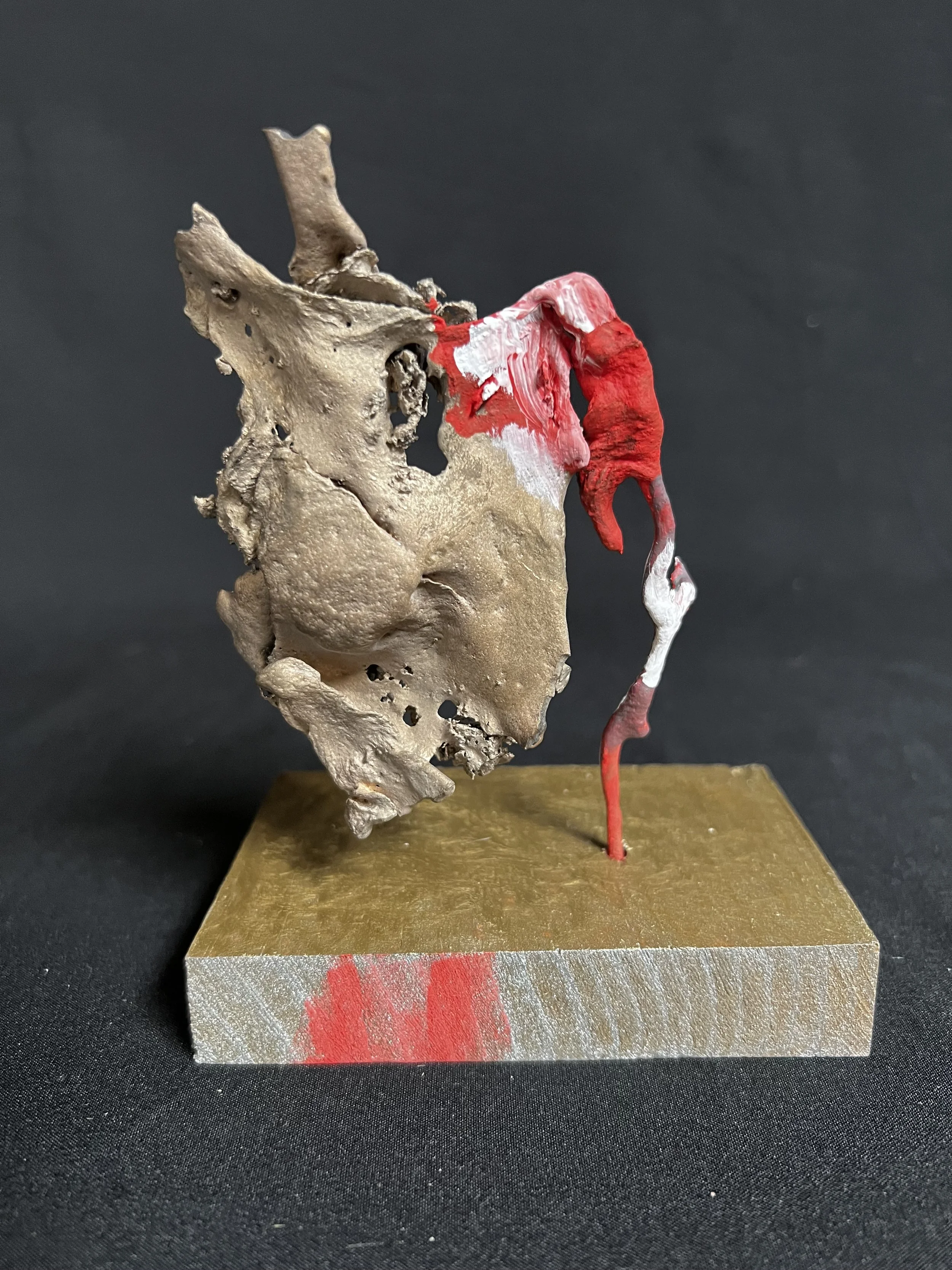 Female Torso with Red Left Arm    5"x4"x3" Bronze, Paint    $1000.00