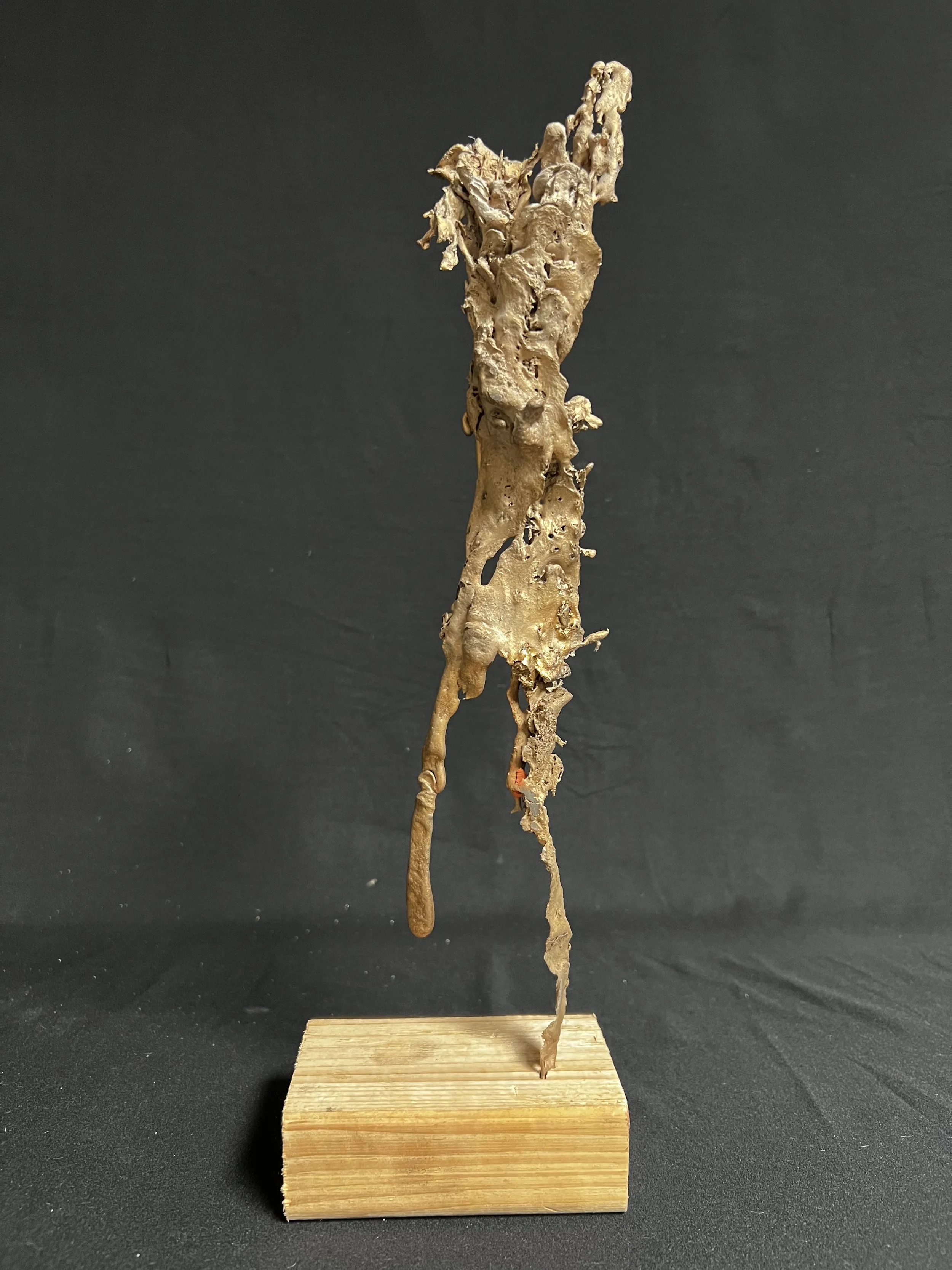 Figure Walking 15"x5"x4"    Bronze, Epoxy Putty, Paint, Wood    $1500.00