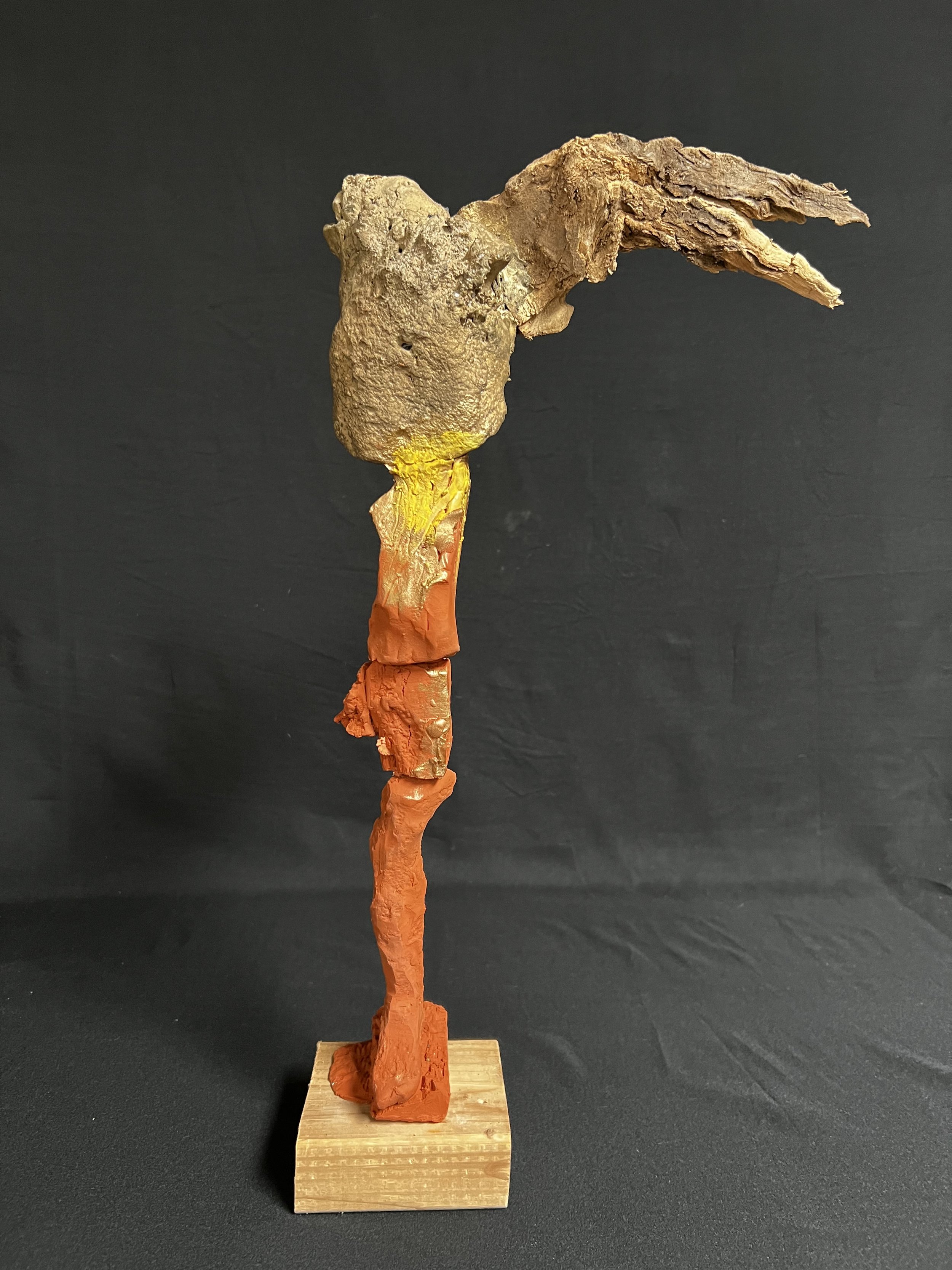 Standing Torso with Wing     20"x4"x4"     Bronze, Polymer Clay, Paint, Wood     $1800.00