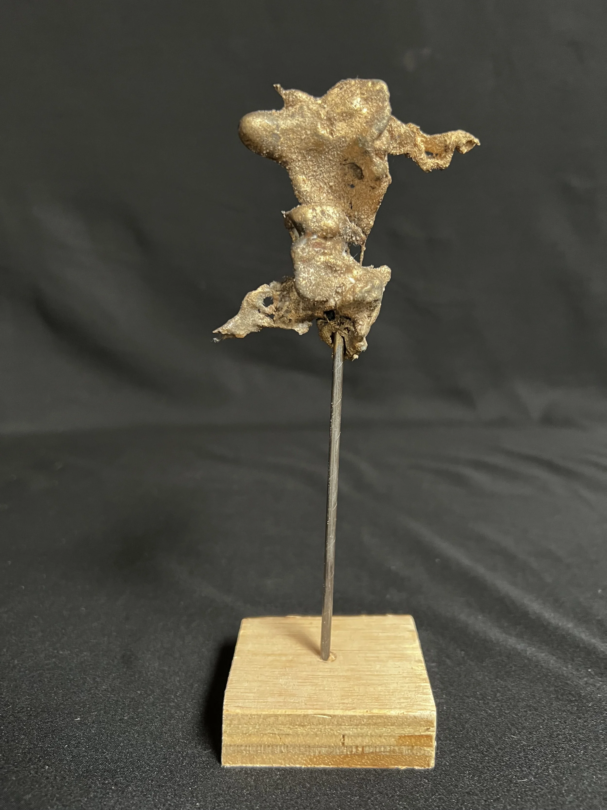 Torso Twisted I     7"x2"x2"    Bronze, Wood     $500.00
