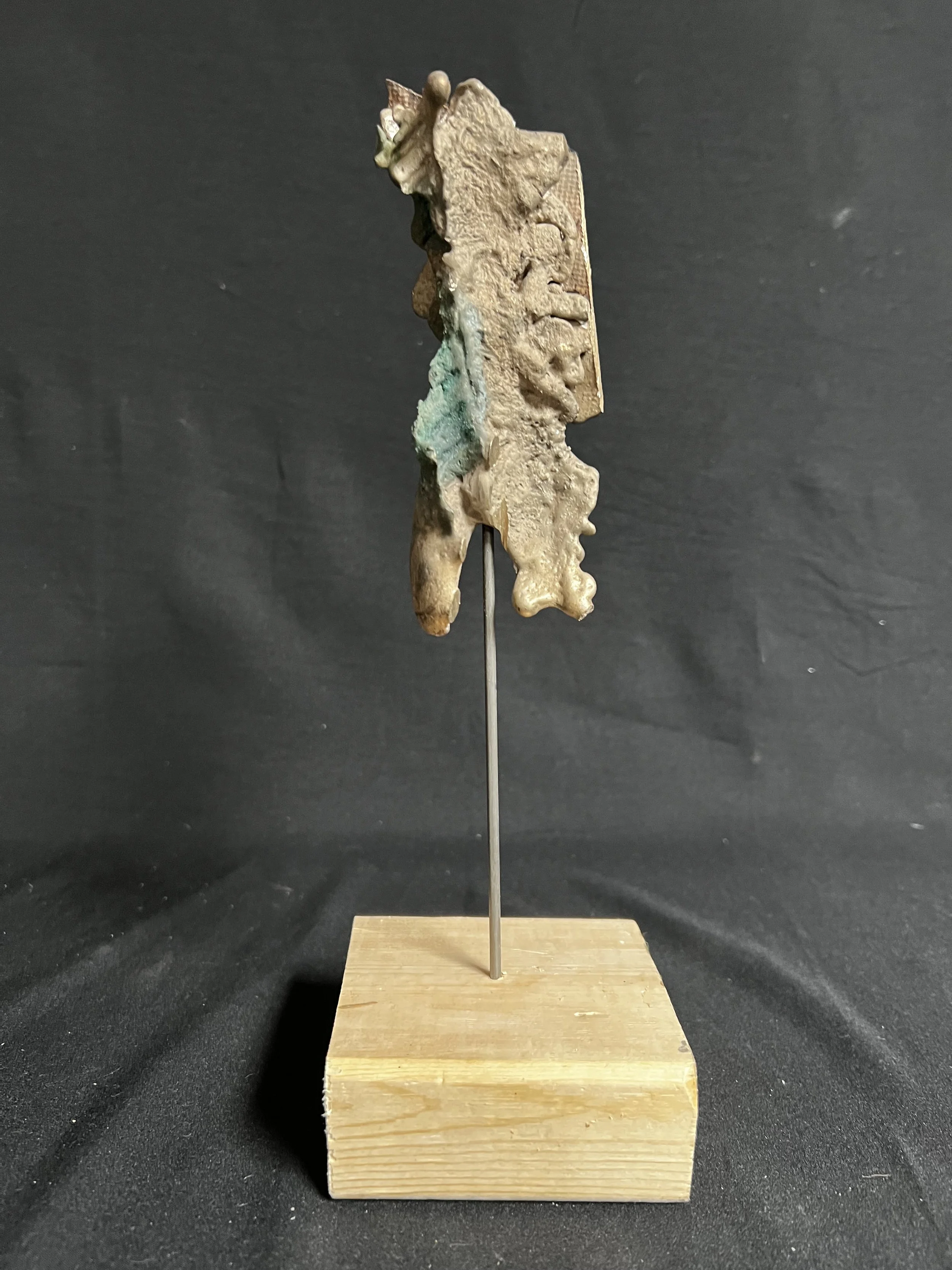 Winged Figure    11"4"x4"    Bronze, Wood, Natural Patina    $500.00