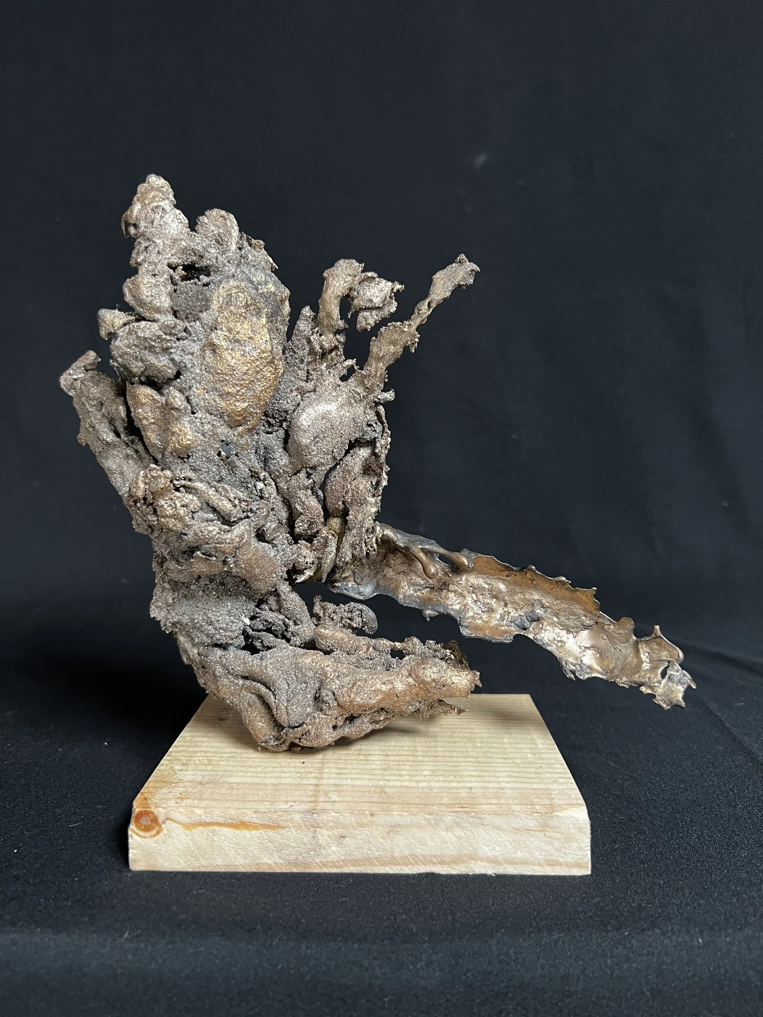 Reclining Figure II    8"x7"x4"    Bronze, Epoxy Putty, Paint, Wood    $1800.00