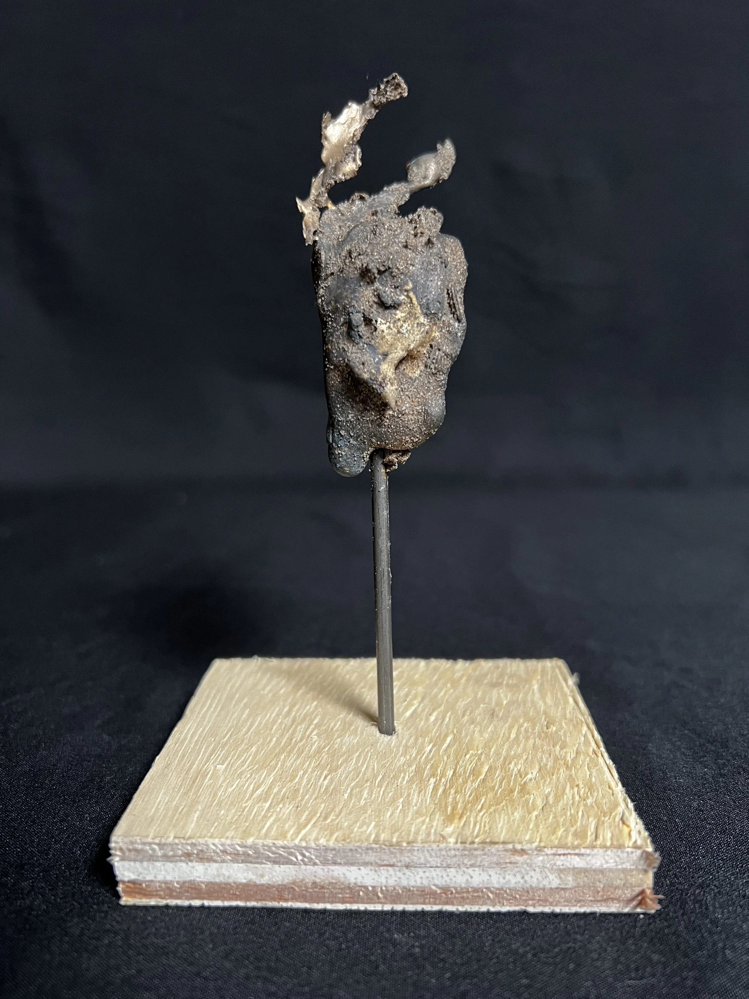 Jewel Series_Winged Torso I     5"x3"x3"    Bronze, Epoxy Putty, Paint, Wood     $500.00