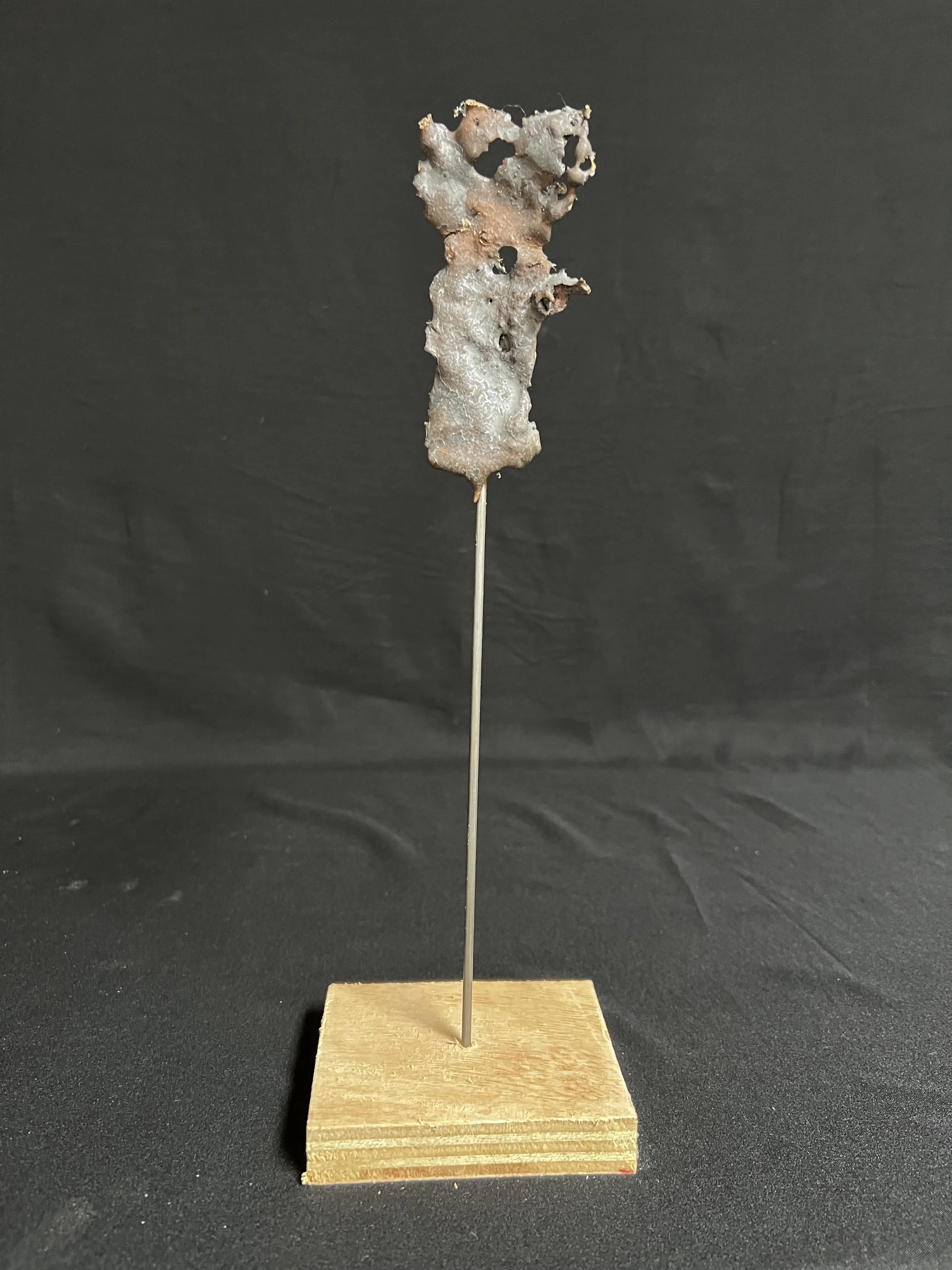 Figure I      13"x4"x4"     Bronze, Epoxy Putty, Paint, Wood     $700.00