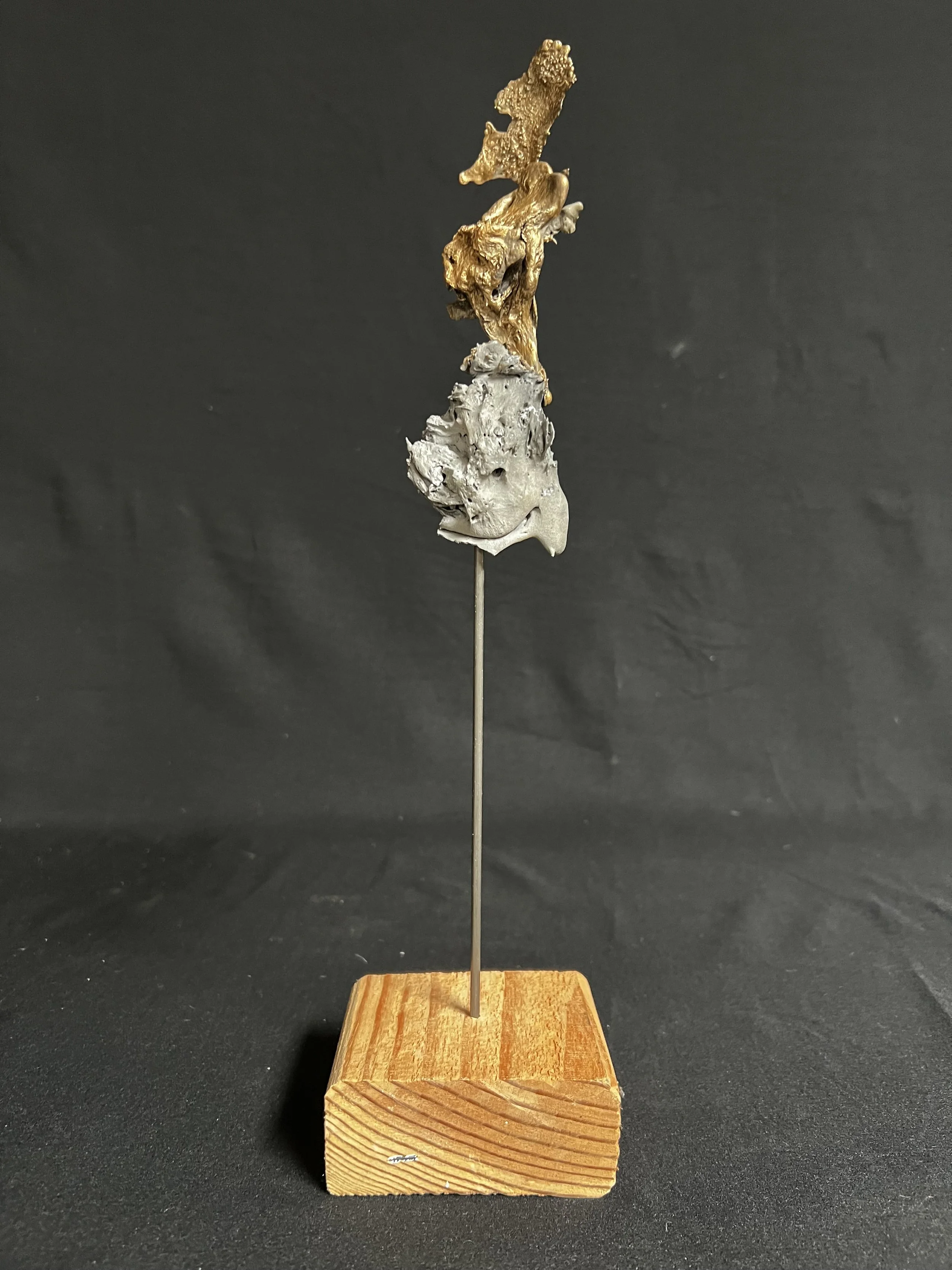 Winged Torso Ascending II    14"x3"x3"    Bronze, Aluminum, Epoxy putty, Paint, Wood    $800.00