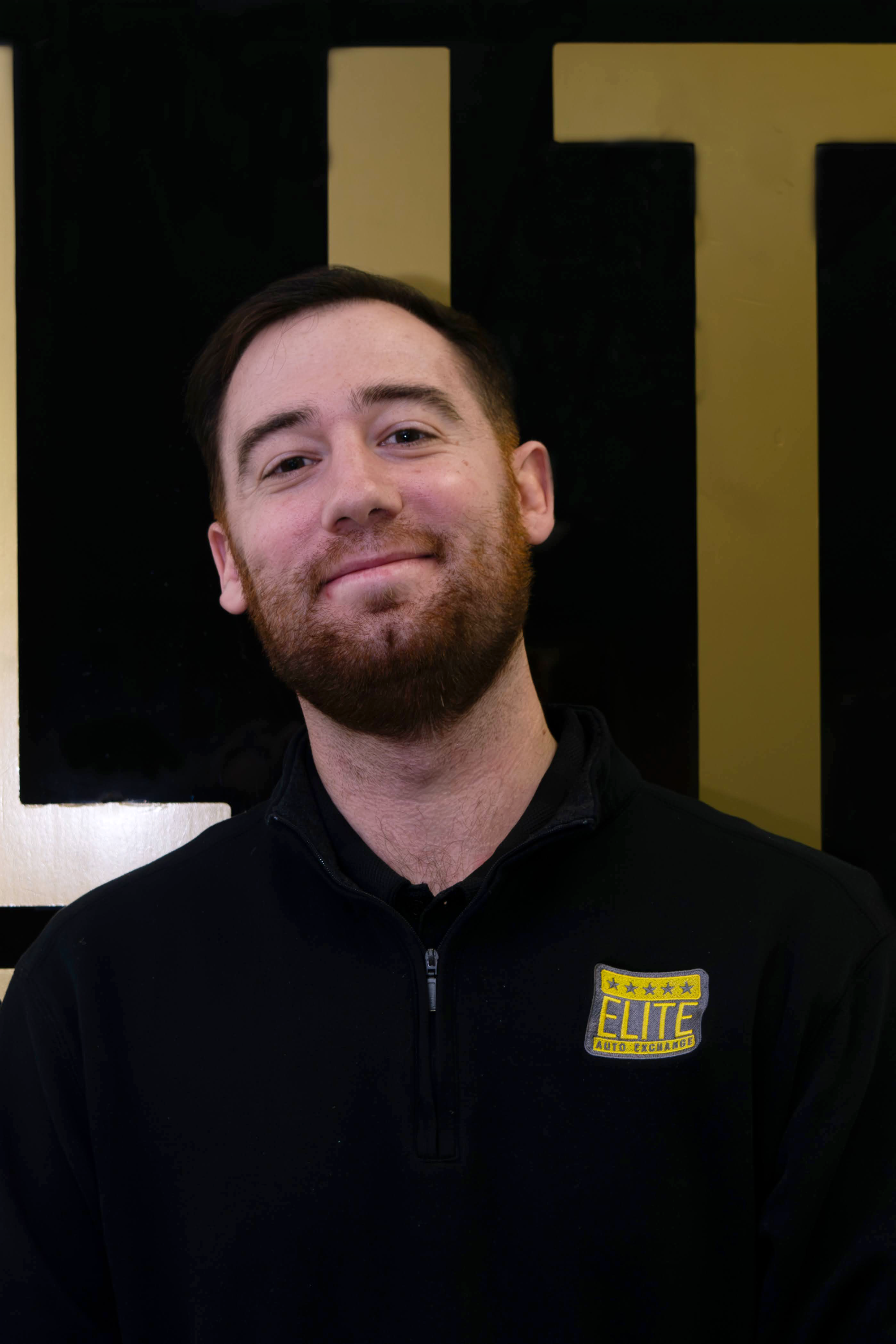 Elite Auto Exchange sales team member portrait