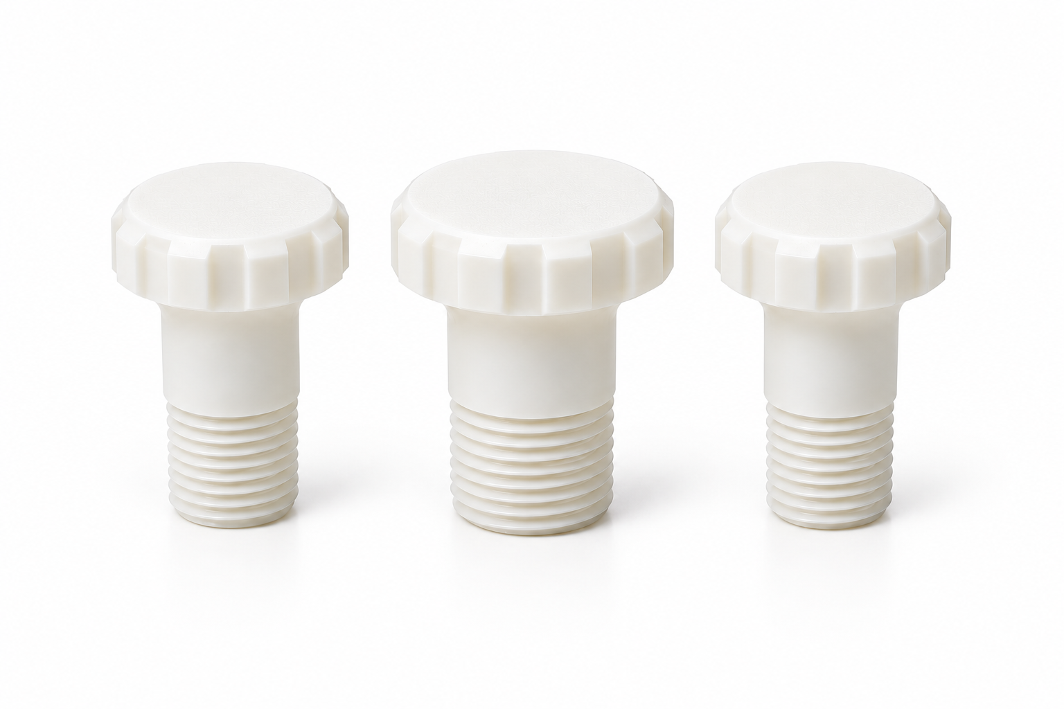 Three Ivory Knurled Thumb Screws.png