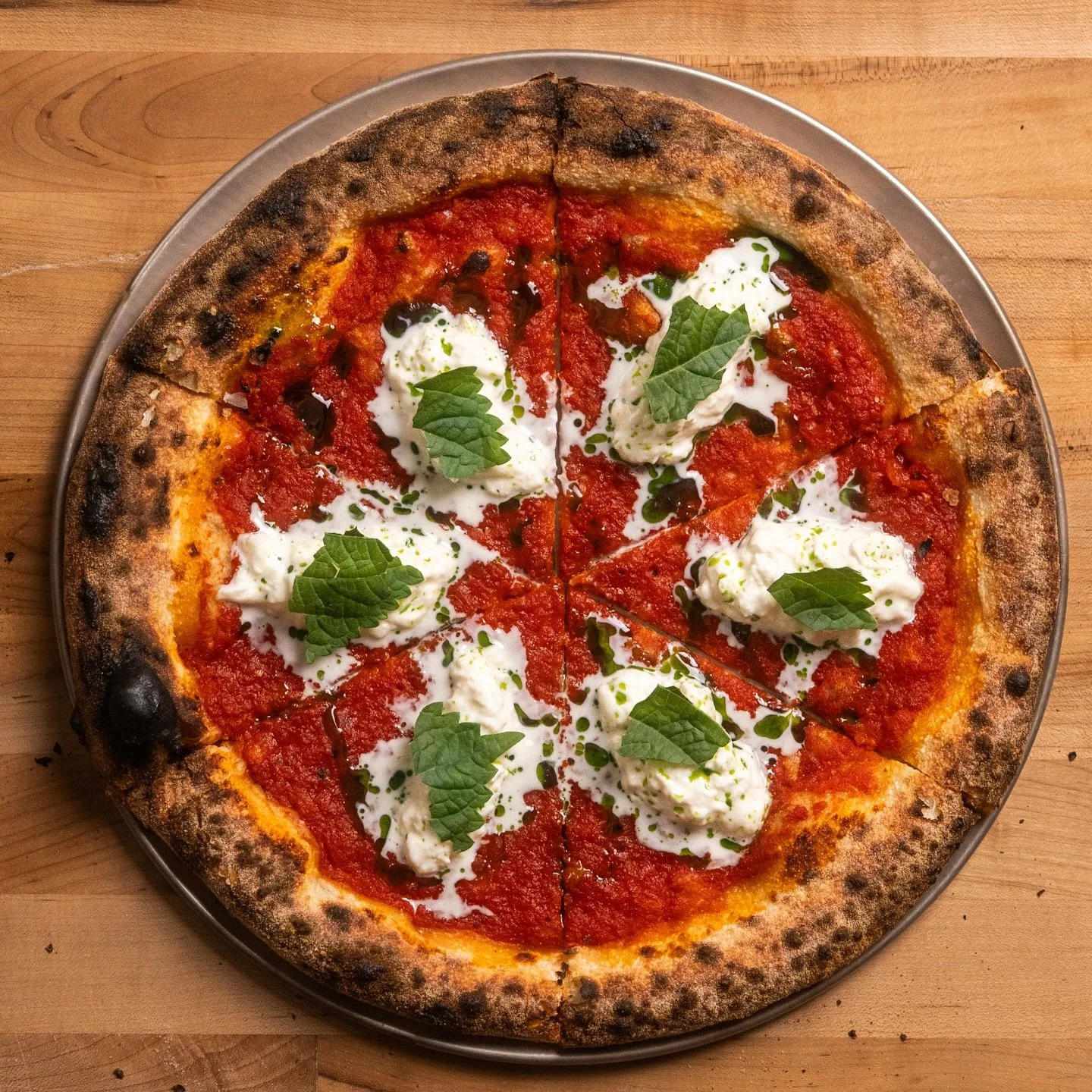 Korean Margherita 

Gochujang Tomato &bull; Straciatella &bull; Perilla Oil &bull; Flaky Salt &bull; Perilla Leaves

Baked in the @oonihq Volt 2.

Whoooo wants a perilla oil recipe?