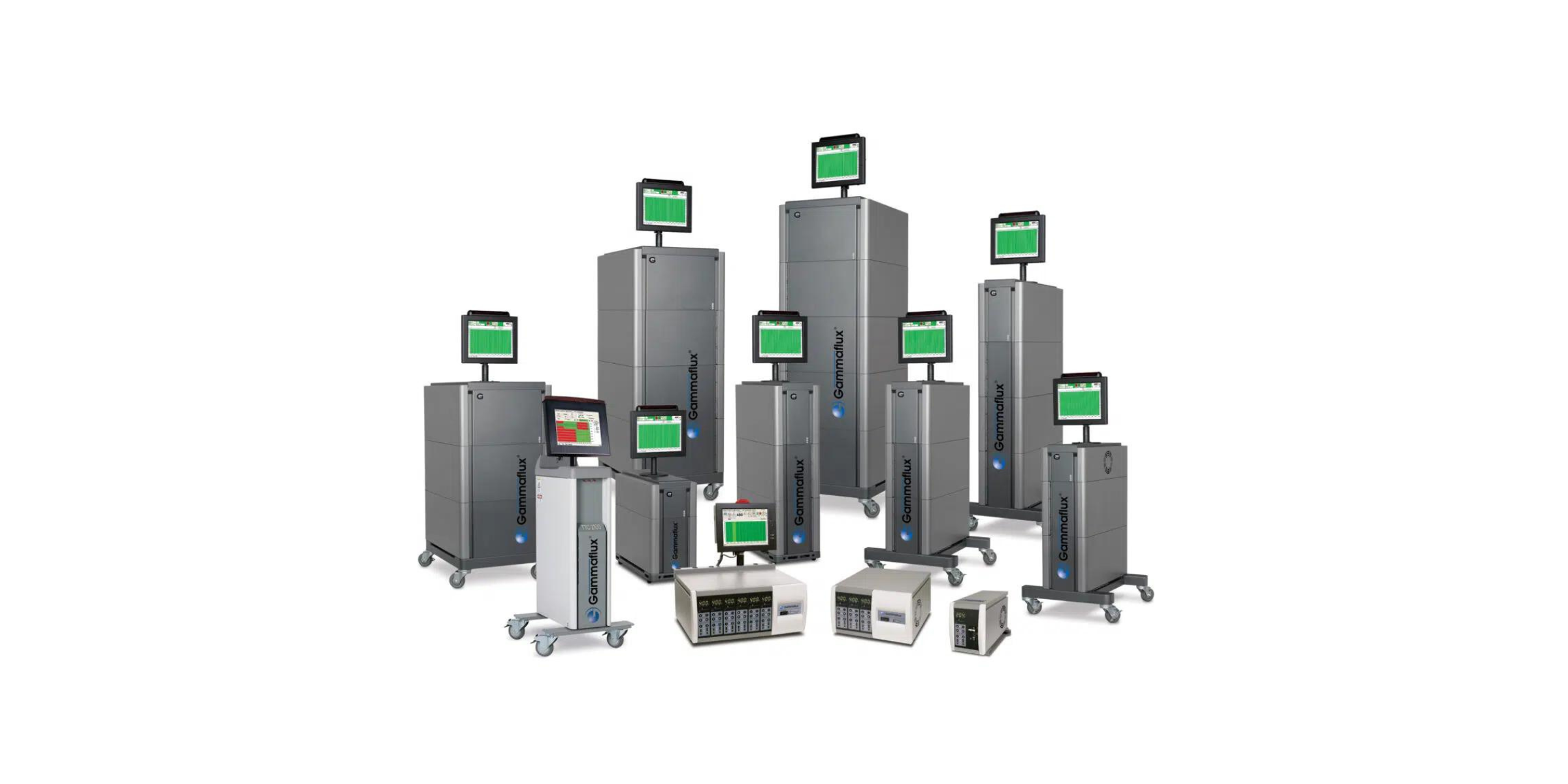 Collection of Gammaflux control units and monitors arranged together.