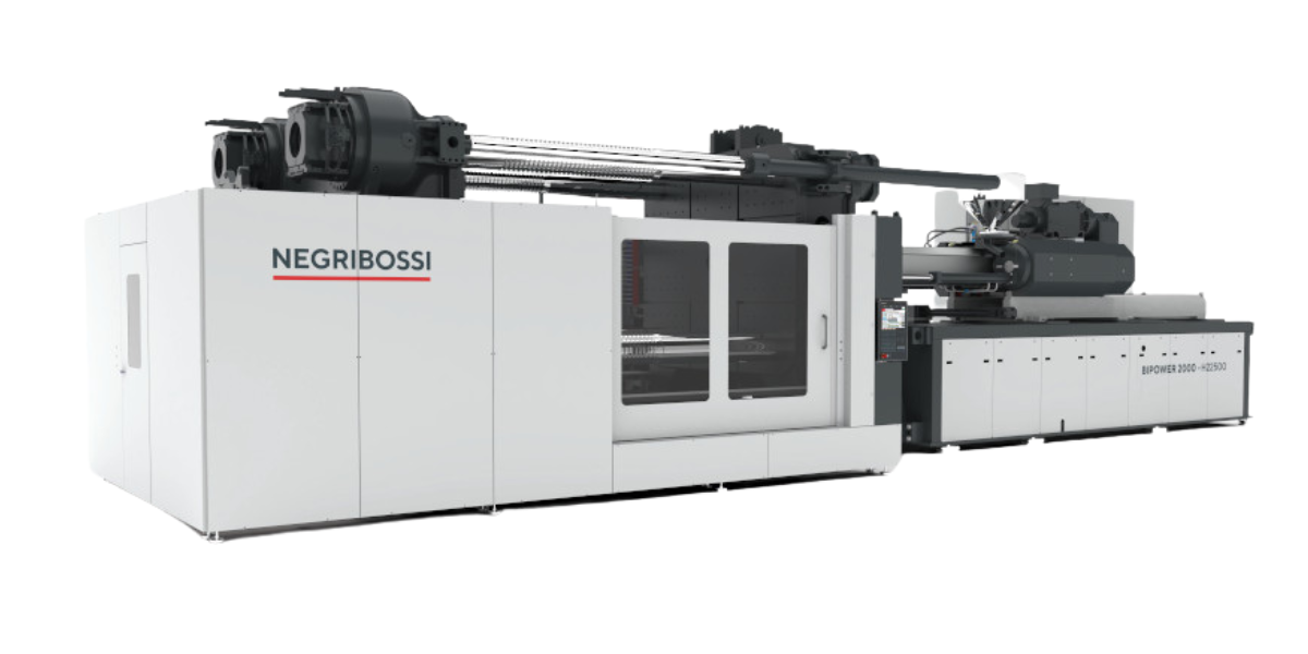 Large industrial machinery with the brand name Negribossi, likely a plastic or rubber injection molding machine.
