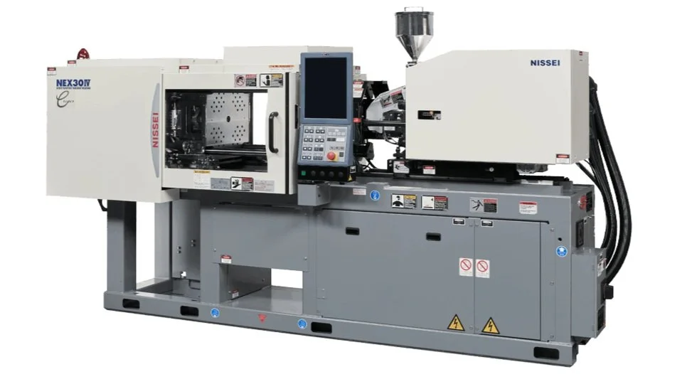 Industrial injection molding machine with control panel, branded 'NISSEI', used for manufacturing plastic parts.