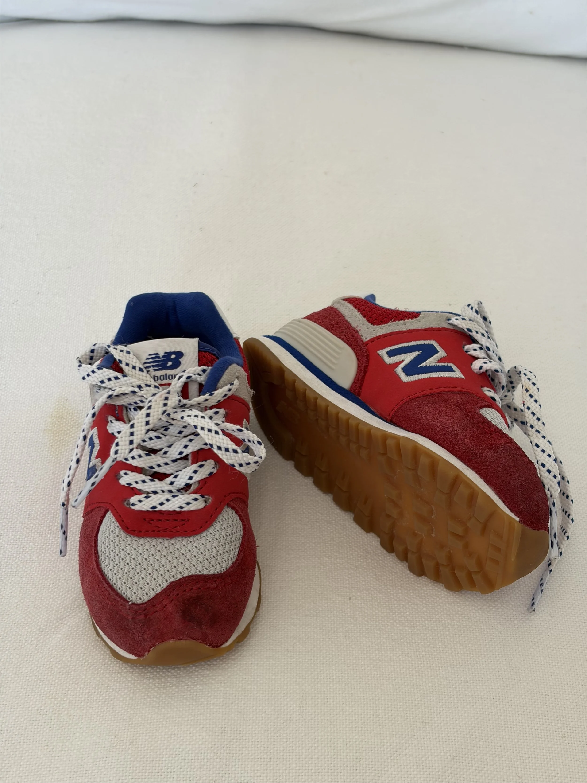 Red, White & Blue New Balances 574 Sneakers