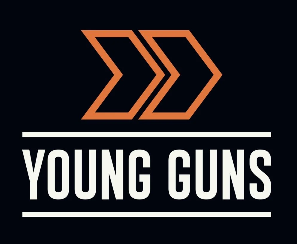 Logo for Young Guns featuring three stylized orange arrows pointing right above the text 'YOUNG GUNS' on a black background.