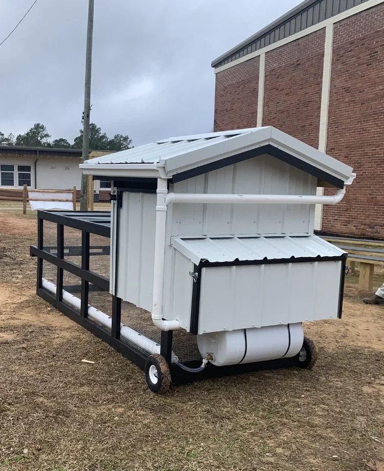 chic tractor rear:w:water.jpg