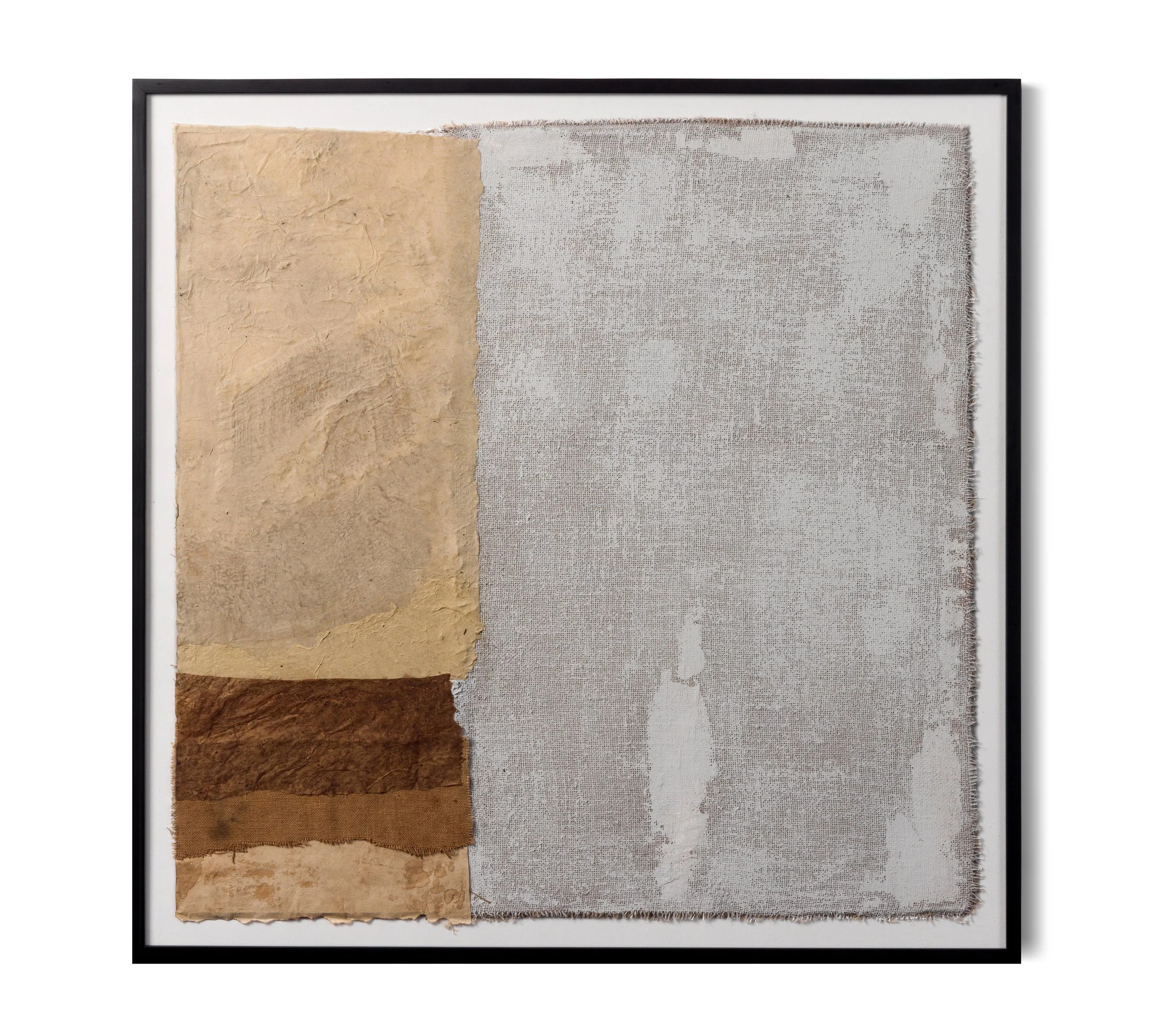 Mixed media artwork with textured paper and fabric, framed in black.