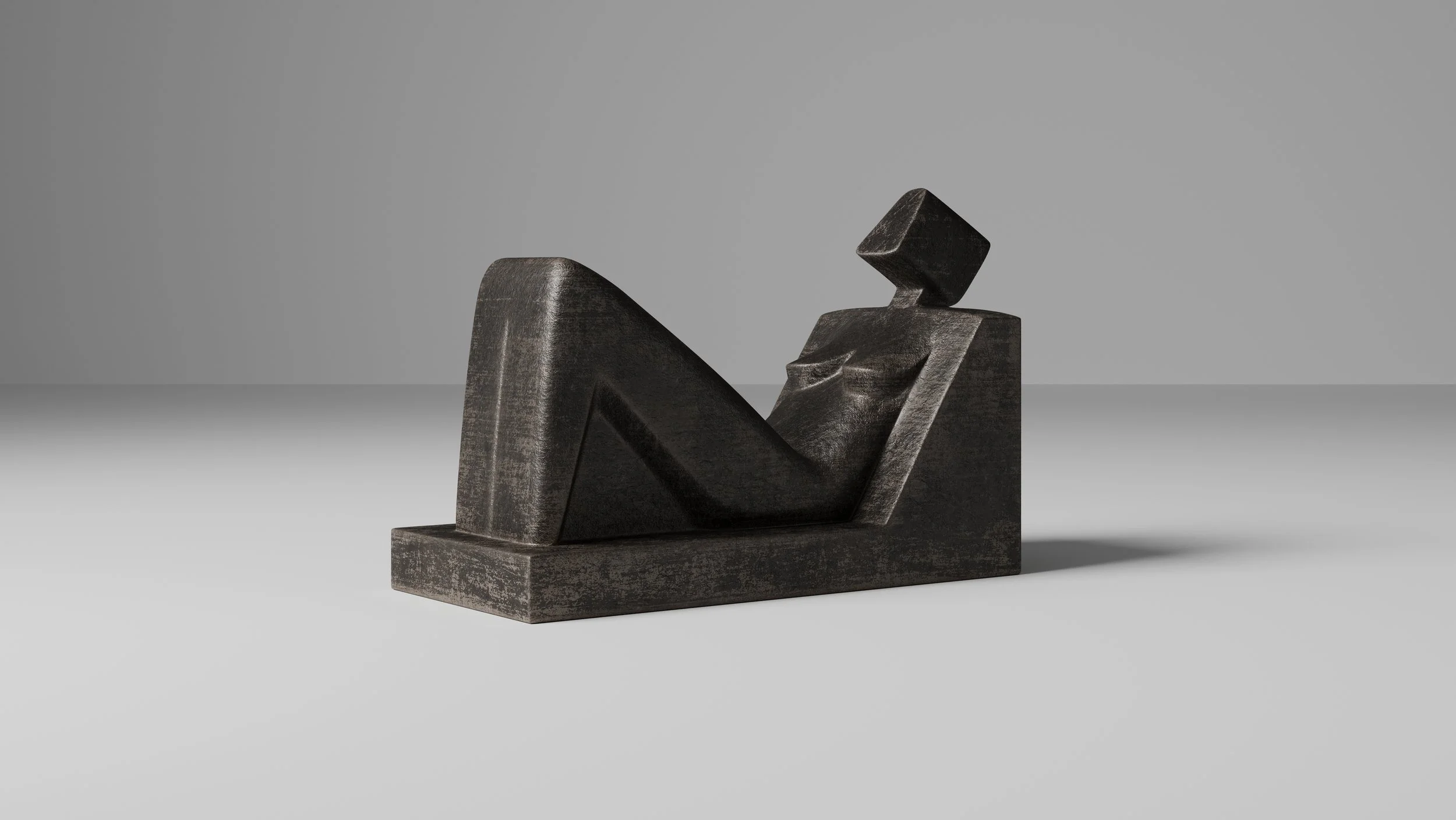 Minimalist cast bronze sculpture of a reclining woman.