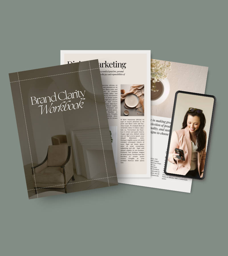 A collection of printed materials and a smartphone displaying a happy woman.