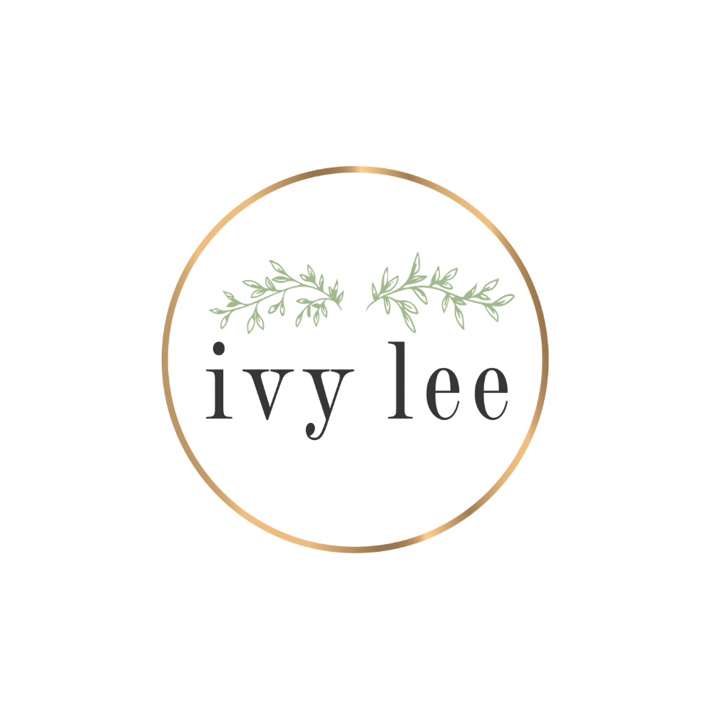 A circular badge featuring three green olive branches on top, with the word 'Olive' in black text in the middle on a gray background.