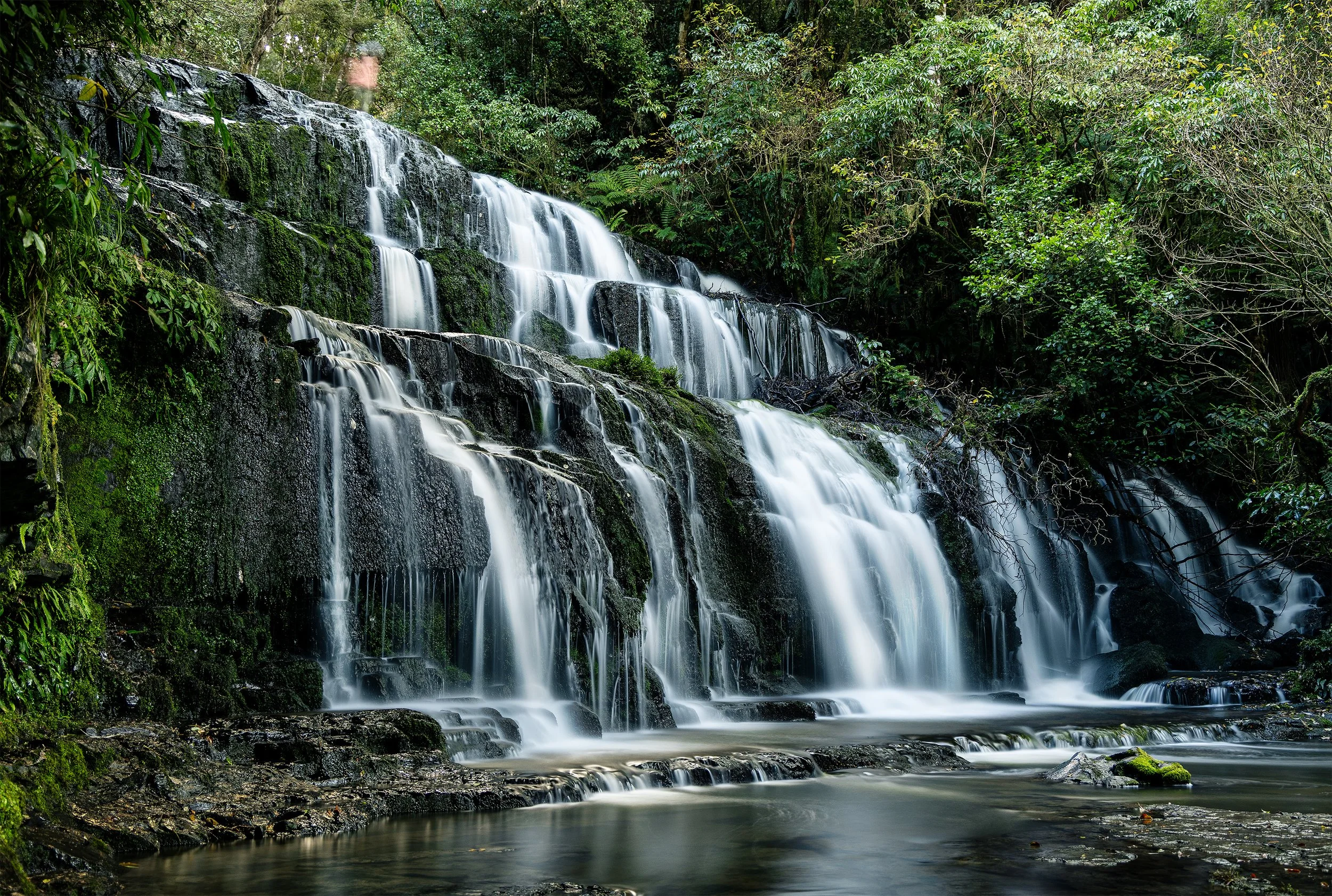 Girl-on-Purakaunui-Falls.jpg