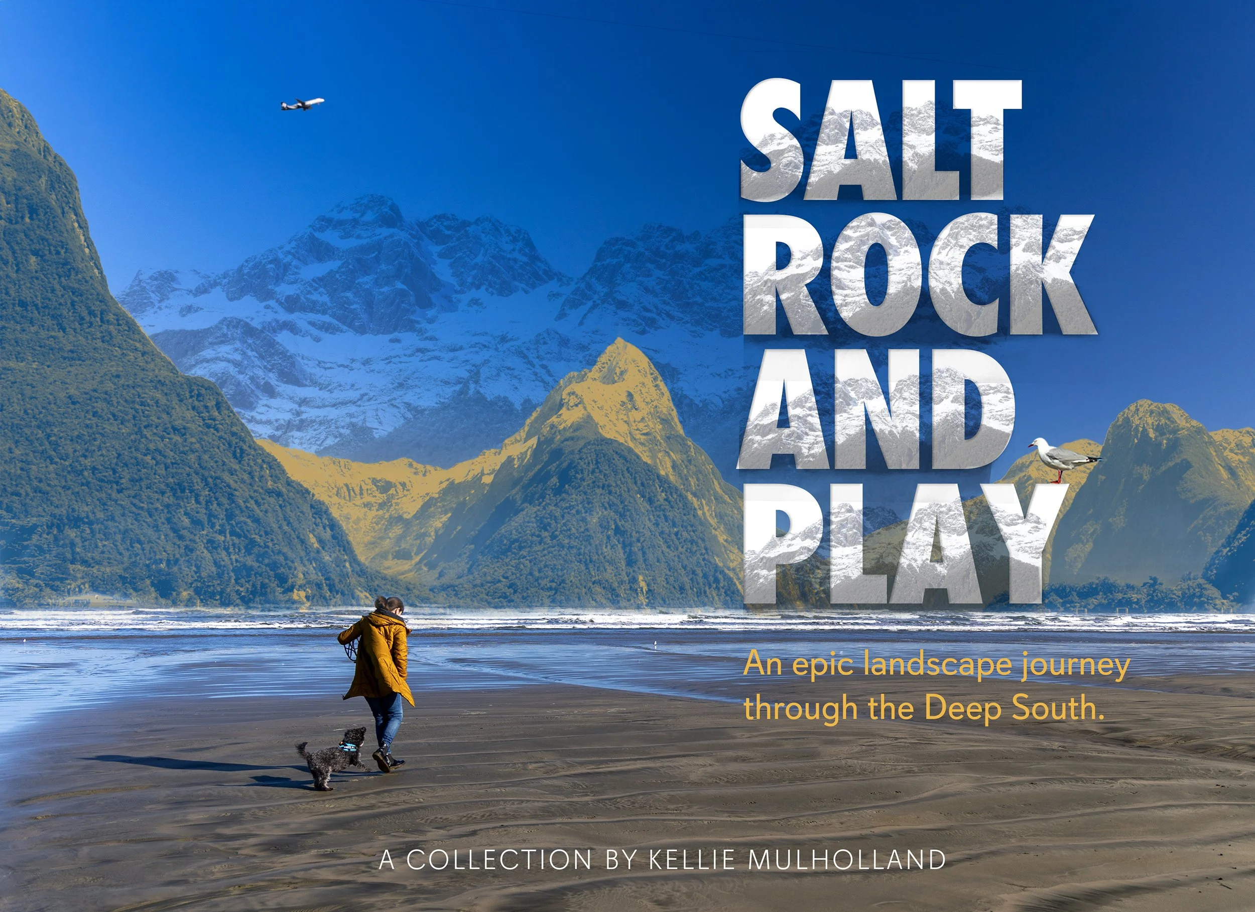 An image of girl playing on a beach with a mountain backdrop.