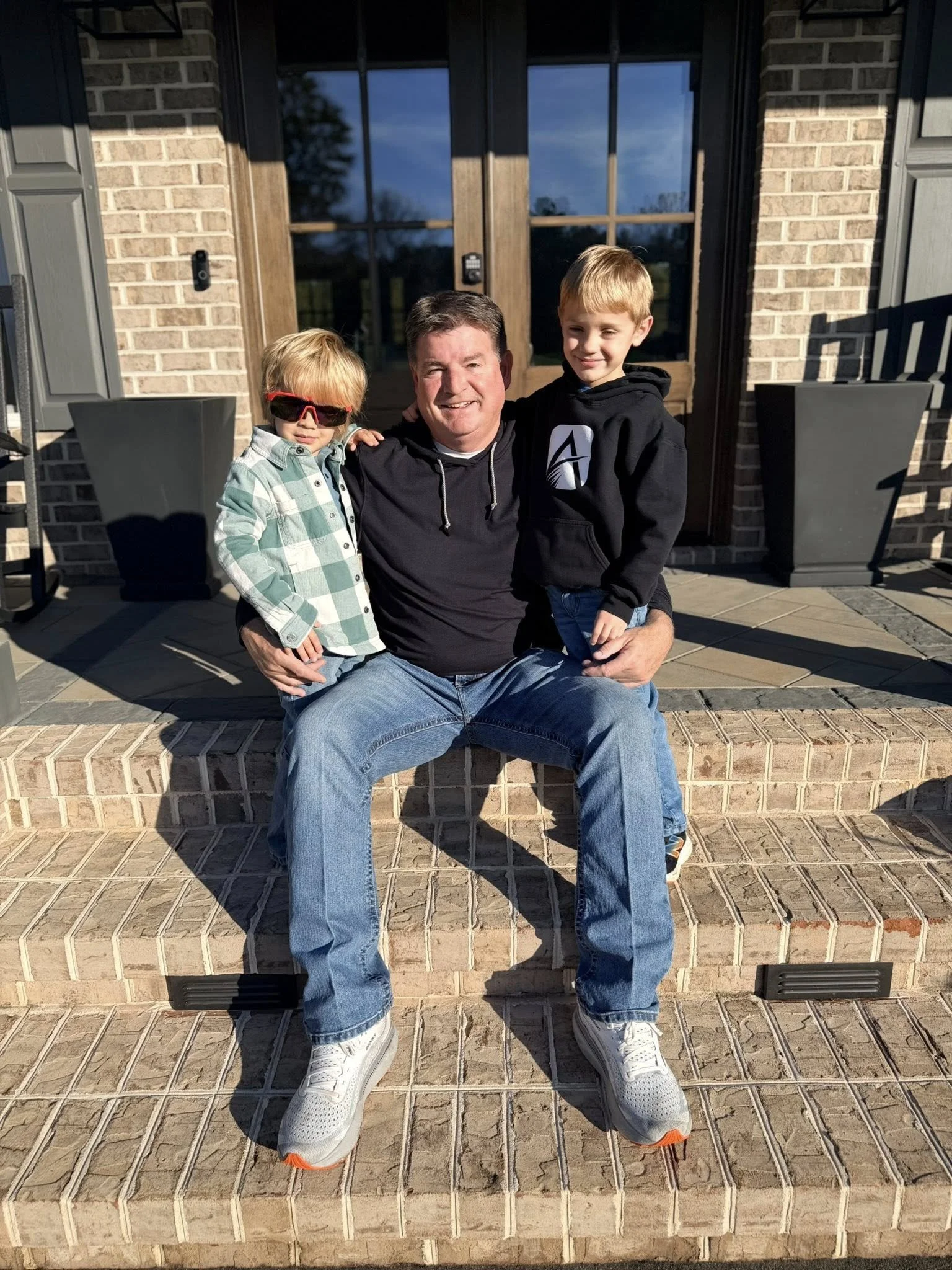 Anderson Outdoor Solution president enjoying time with his grandkids.