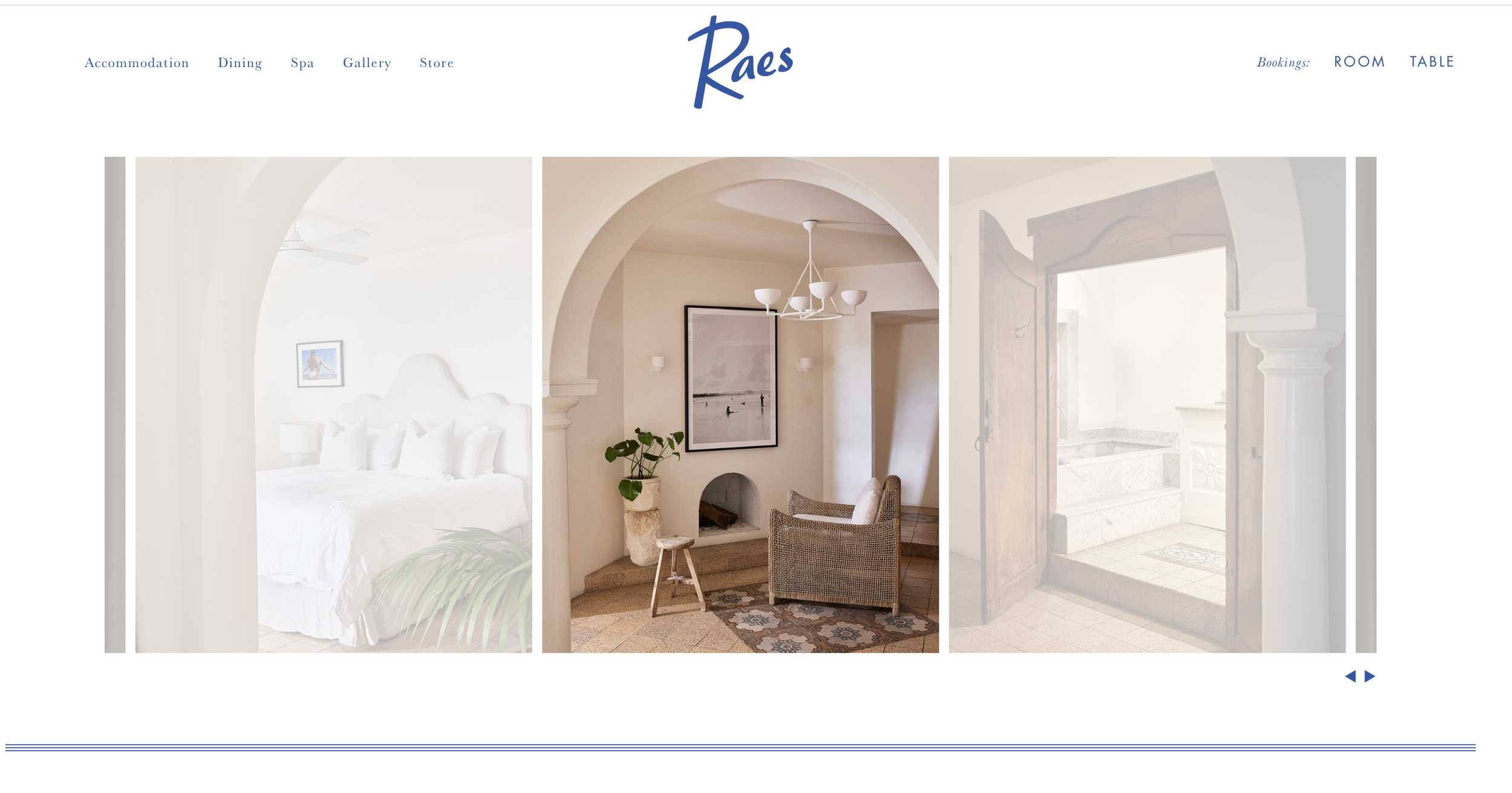 Three interior areas: a bedroom with a white bed, a sitting area with a fireplace, and an entryway with stairs.