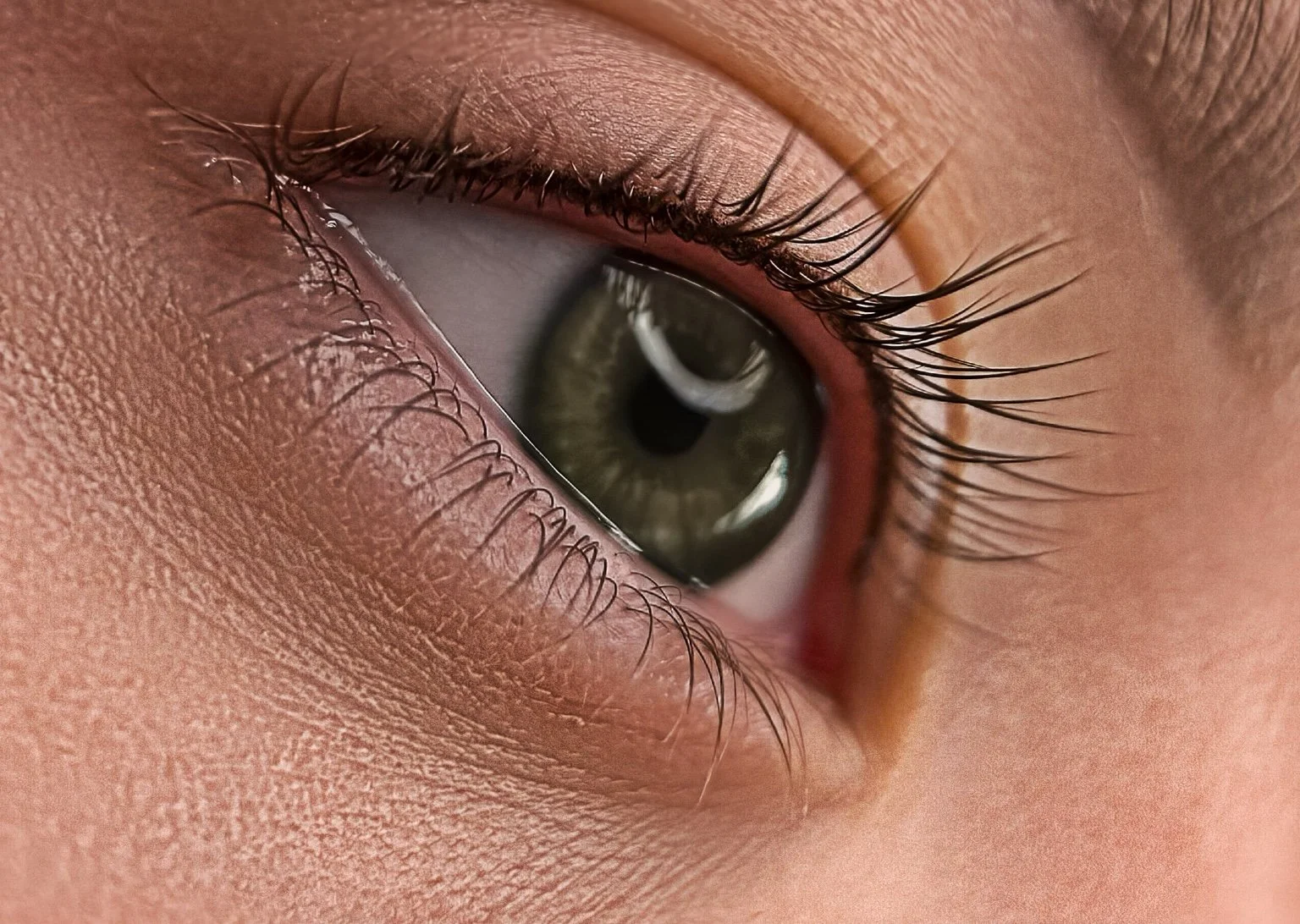Close-up of natural lash line enhancement eyeliner permanent makeup creating subtle definition in Lynchburg, Virginia
