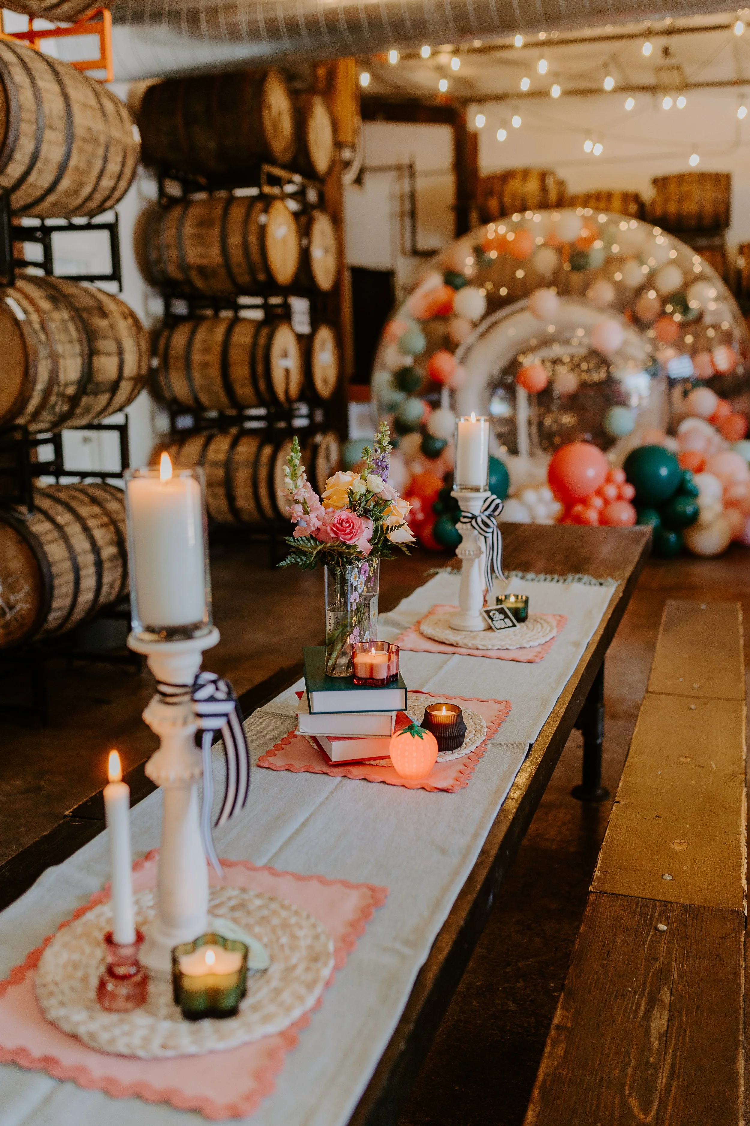 A tablescape with a balloon display in the background