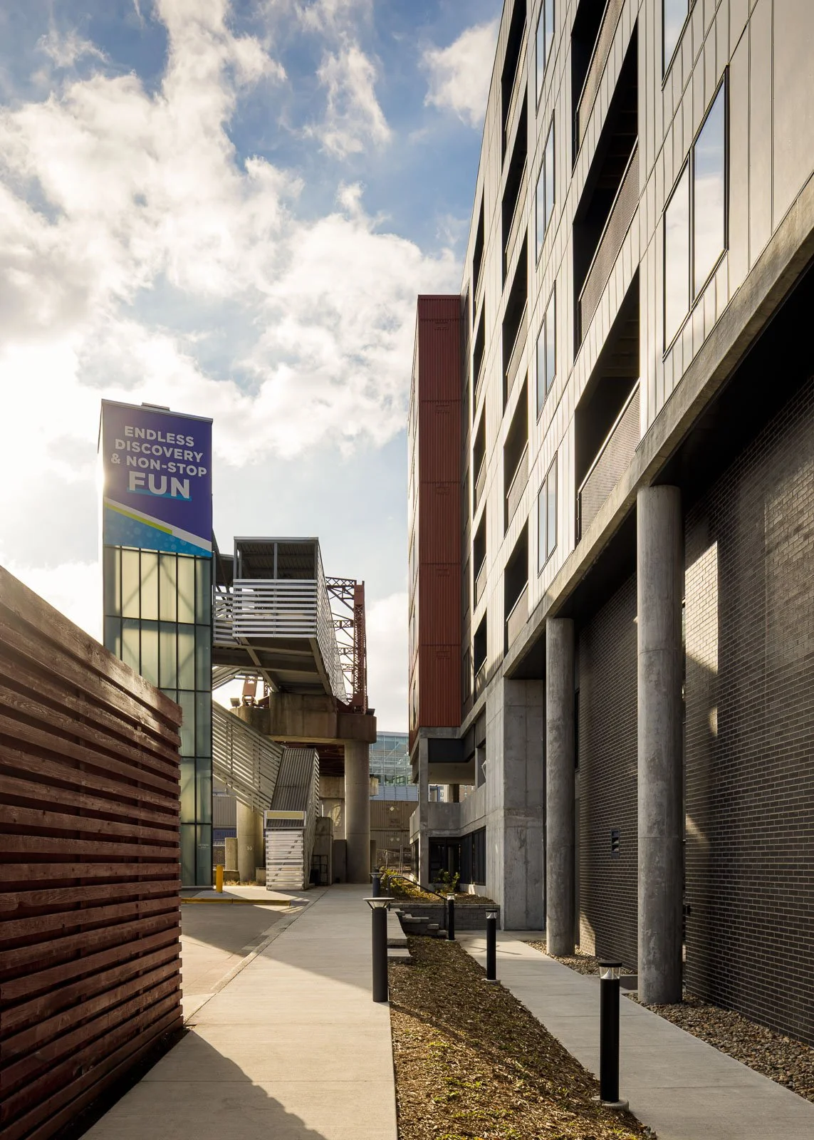 Overall exterior composition of Tracks captured to showcase commercial architectural presence and design.