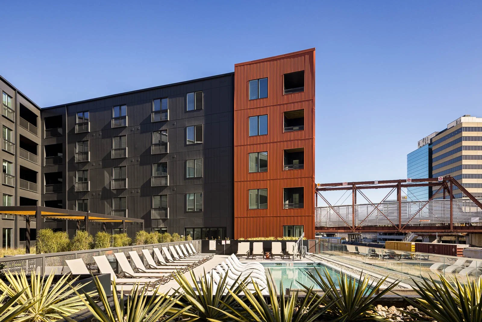 Perspective exterior image of Tracks highlighting façade lines and structural details.