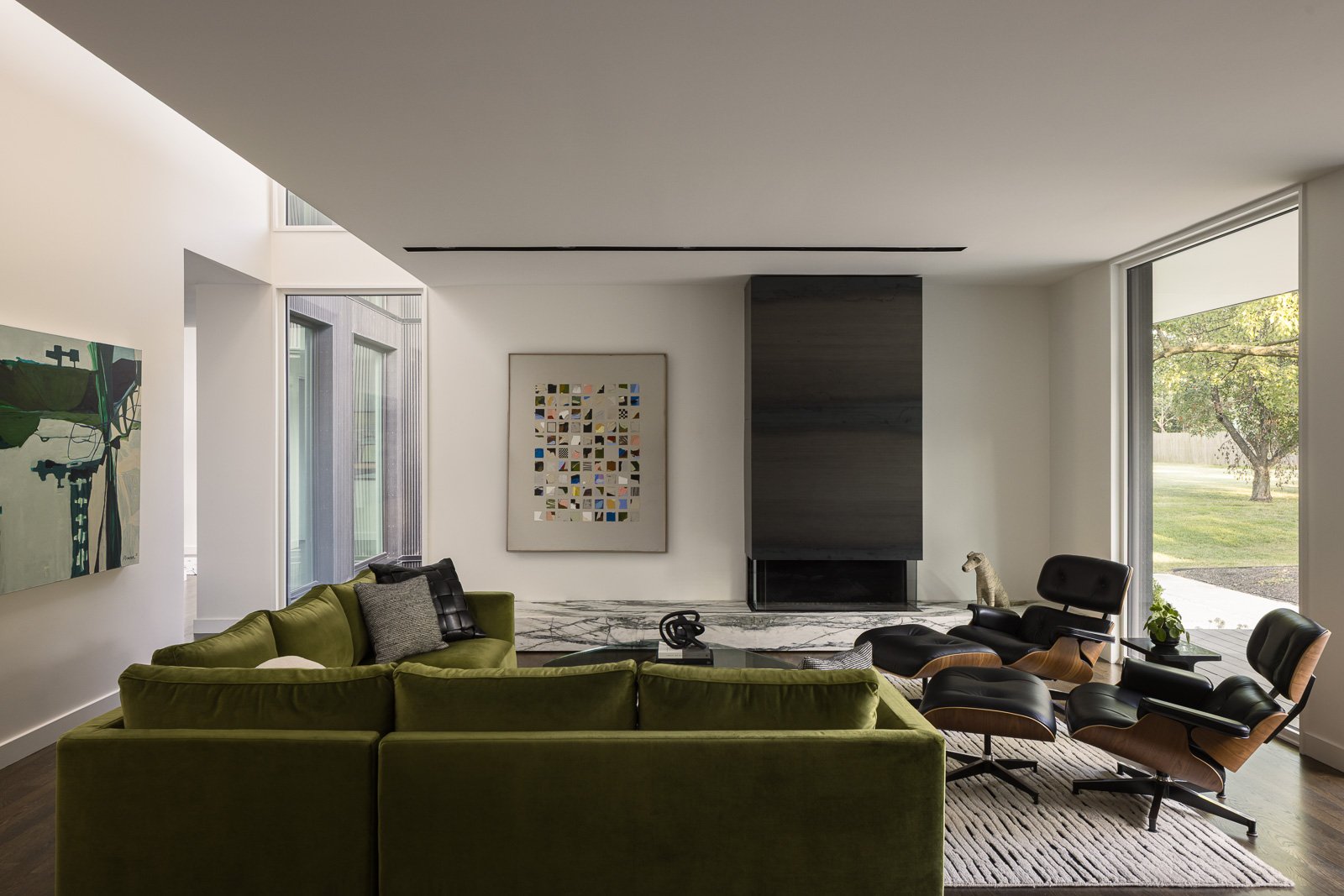 Interior stairway at Prairie Light residence with wood detailing and natural light