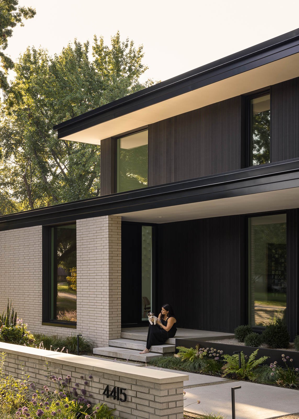 Exterior view of Prairie Light residence highlighting architectural lines, materials, and natural light