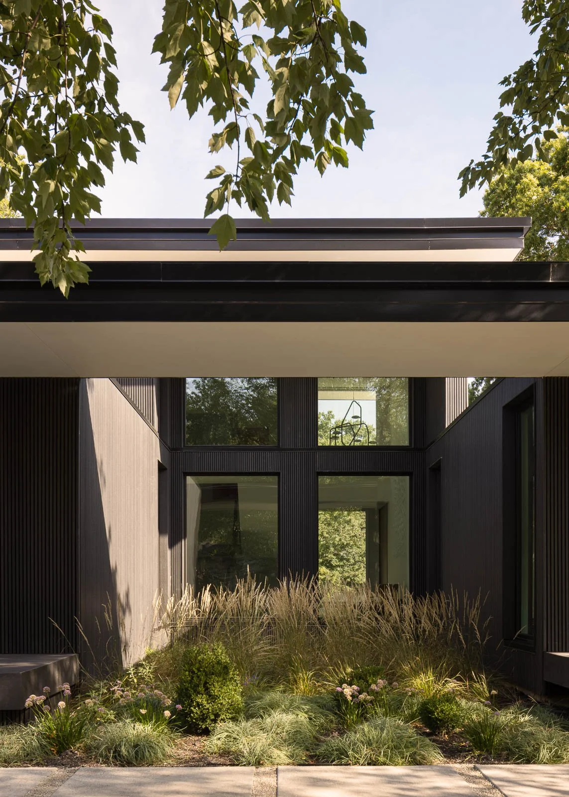 Exterior architectural detail at Prairie Light with window light and material texture