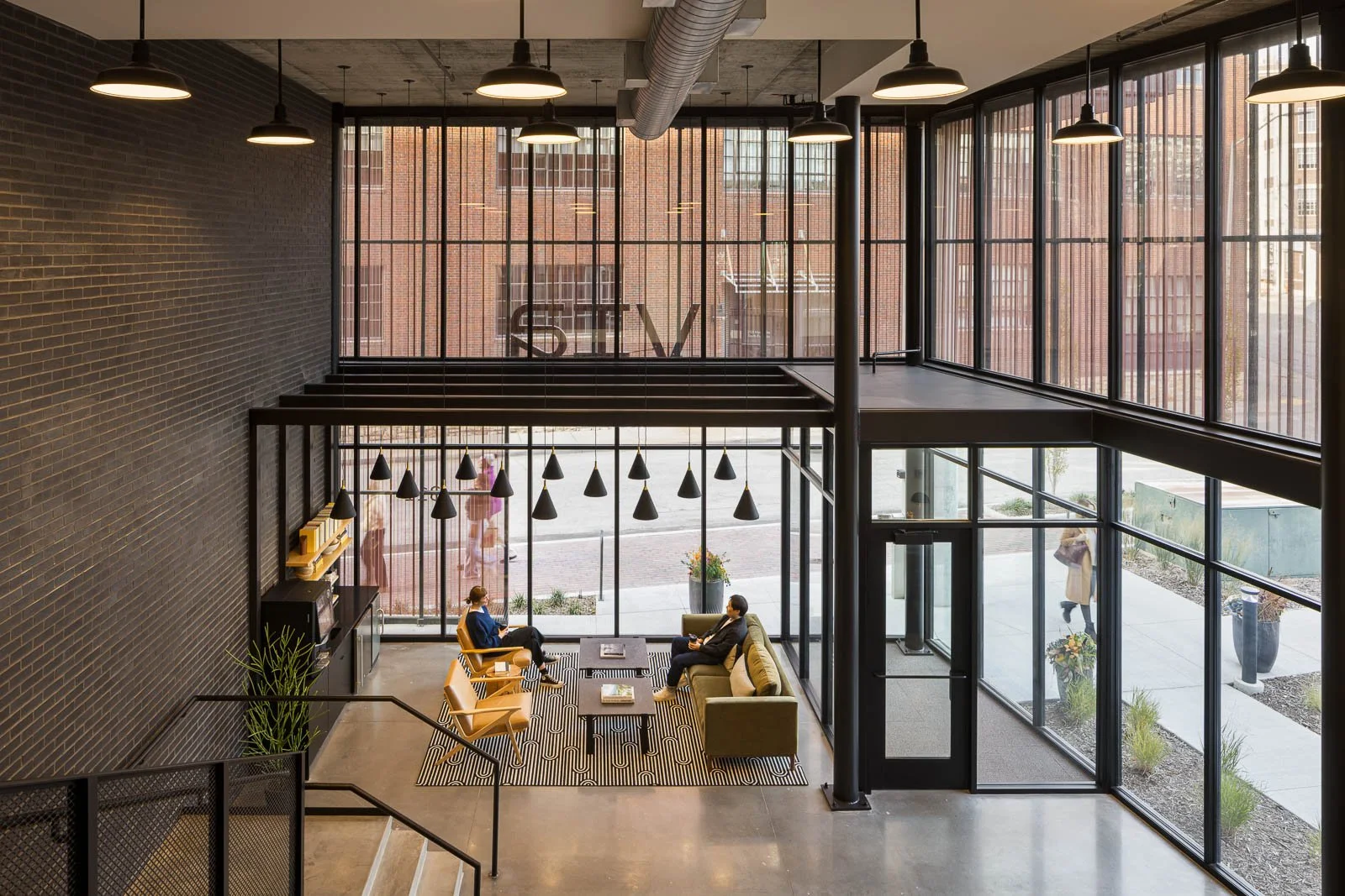 Interior perspective showcasing spatial geometry, light, and design flow in Tracks commercial architecture.